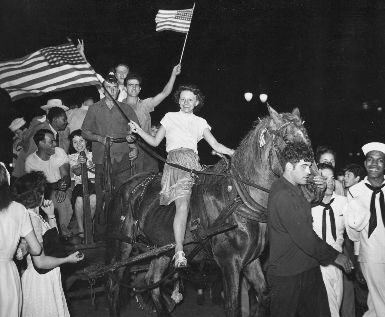 Detroit crowds celebrate Japan's surrender in August 1945.