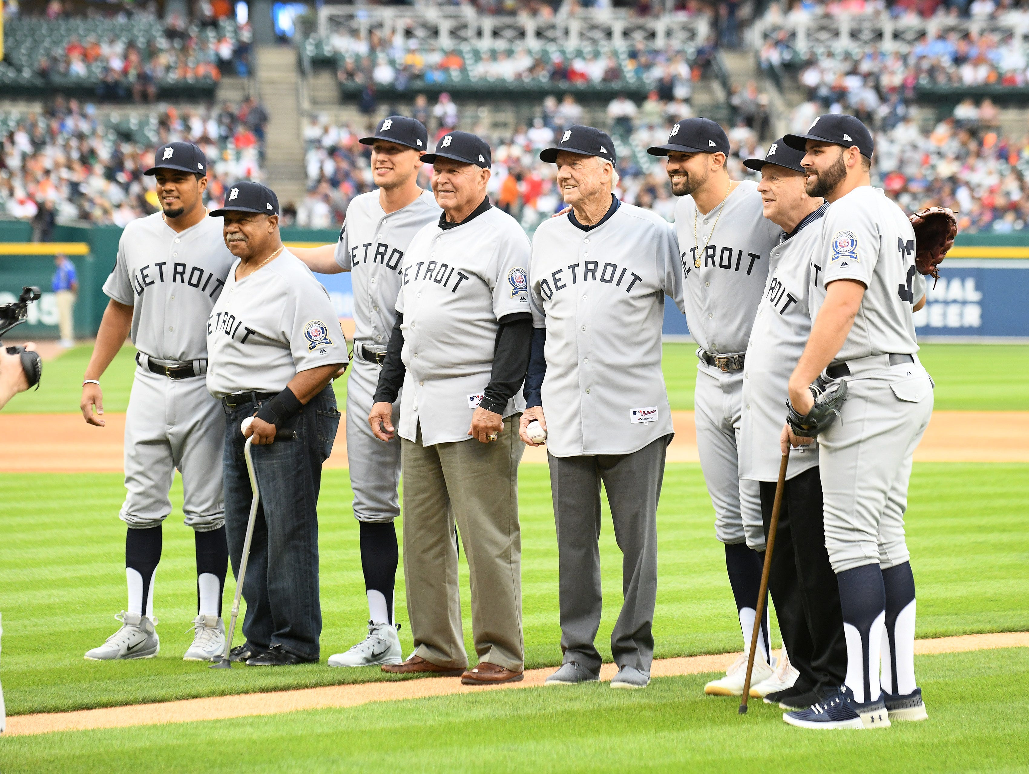 From left, Jeimer Candelario, Willie Horton, JaCoby Jones, Mickey Stanley, Al Kaline, Nicholas Castellanos, Mickey Lolich and Michael Fulmer after the ceremonial first pitch. during a pregame ceremony honoring the 1968 World Series Championship Tigers at Comerica Park on Sept. 8, 2018.