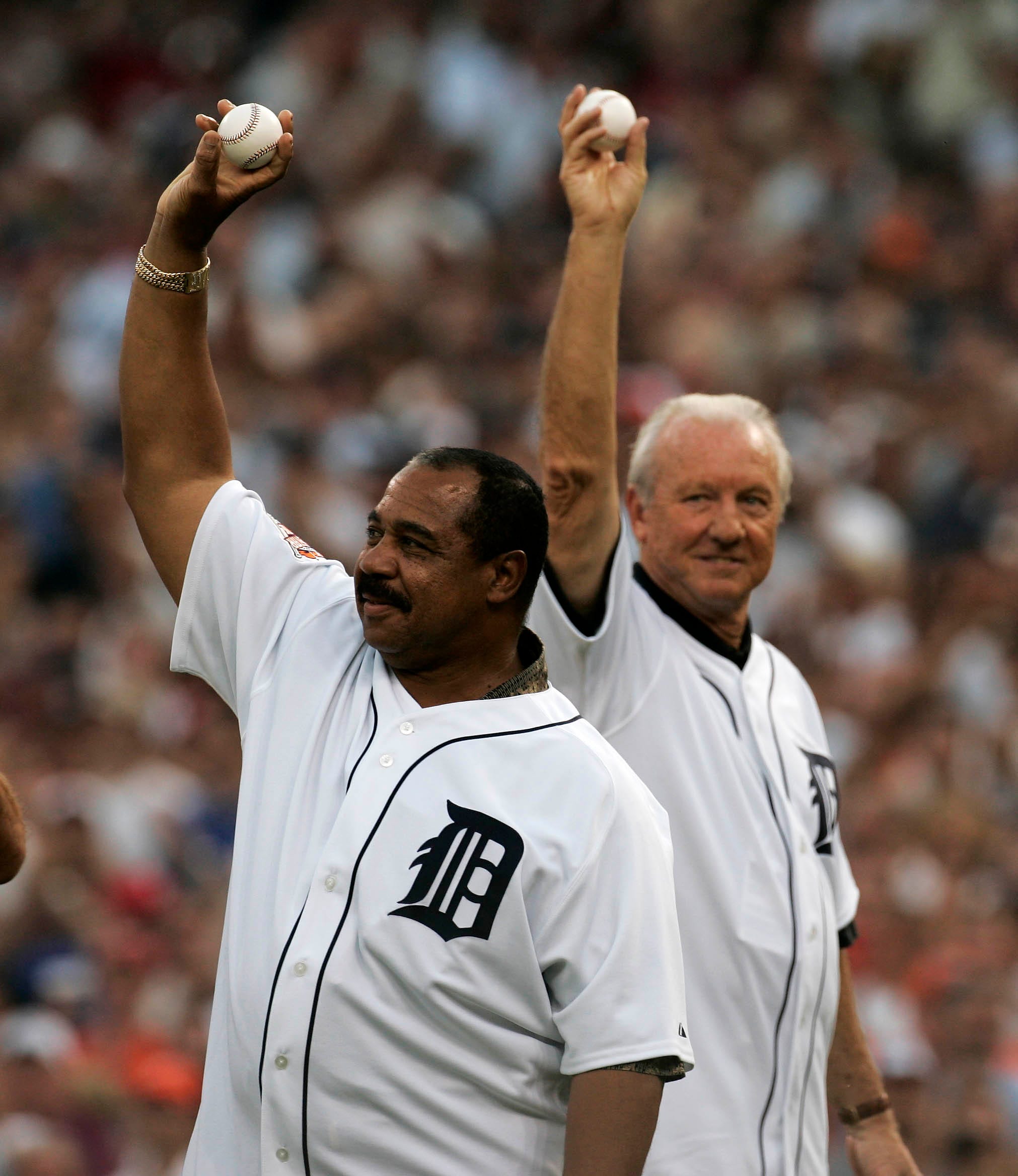 Tiger greats Willie Horton, left, and Al Kaline, wave to the fans before throwing out the ceremonial first pitch, during the All Star game, Tuesday July 12, 2005, at Comerica Park in Detroit.