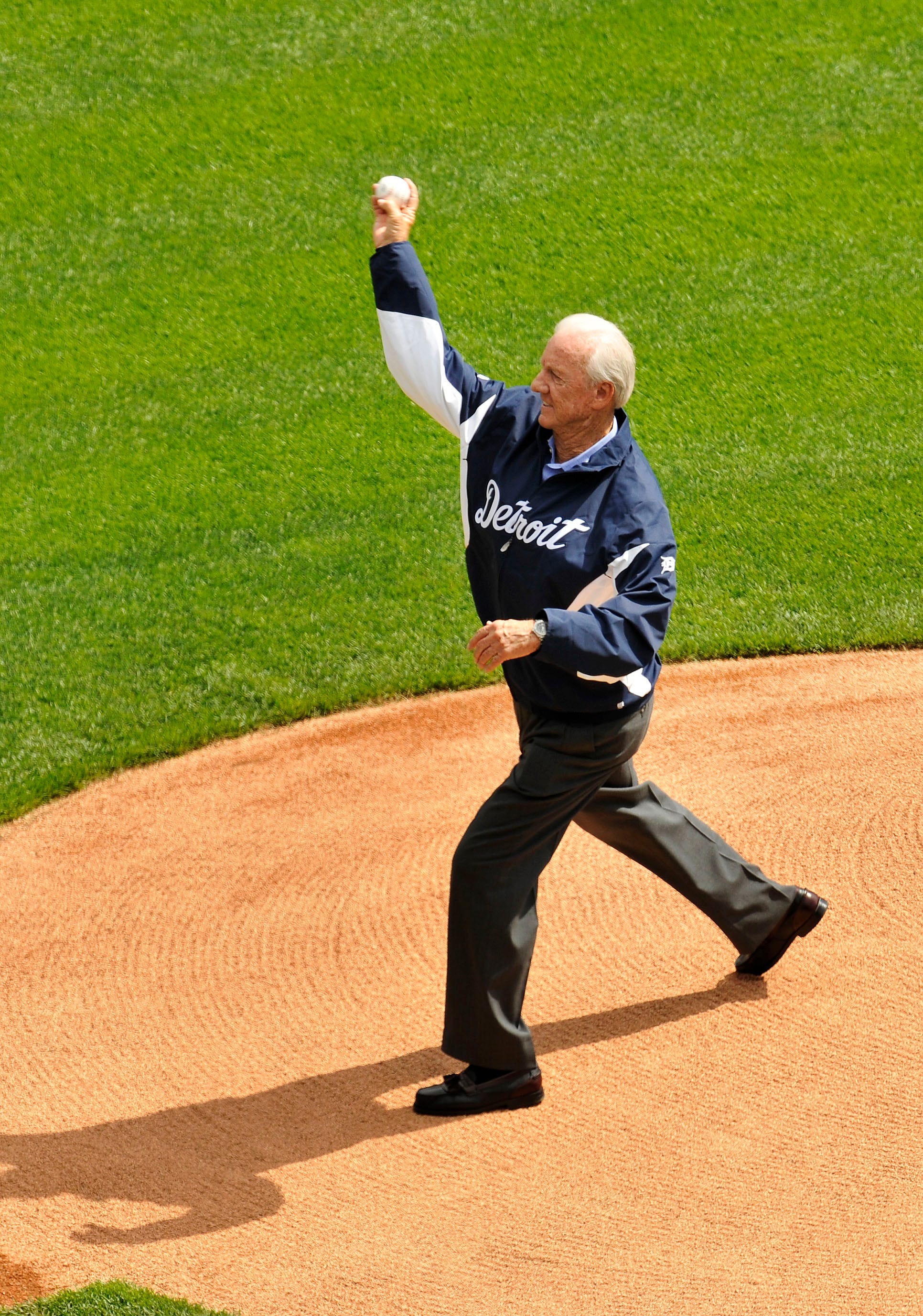 Tiger legend Al Kaline, celebrating his sixth decade with the Tigers organization, throws out the ceremonial first pitch before an Opening Day game against the Boston Red Sox on Thursday, April 5, 2012.