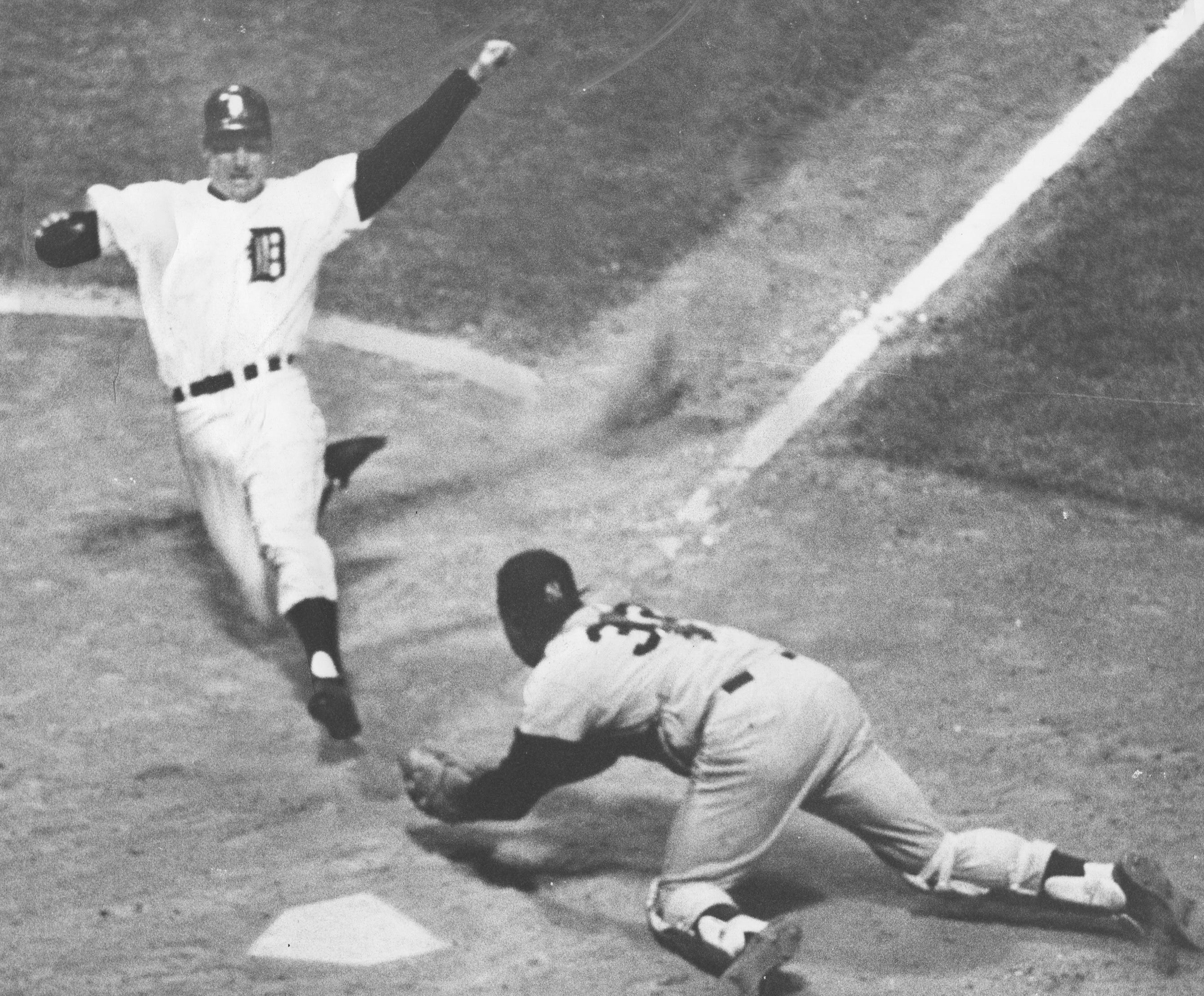 Detroit Tigers' Al Kaline slides into home plate during a game in 1966.