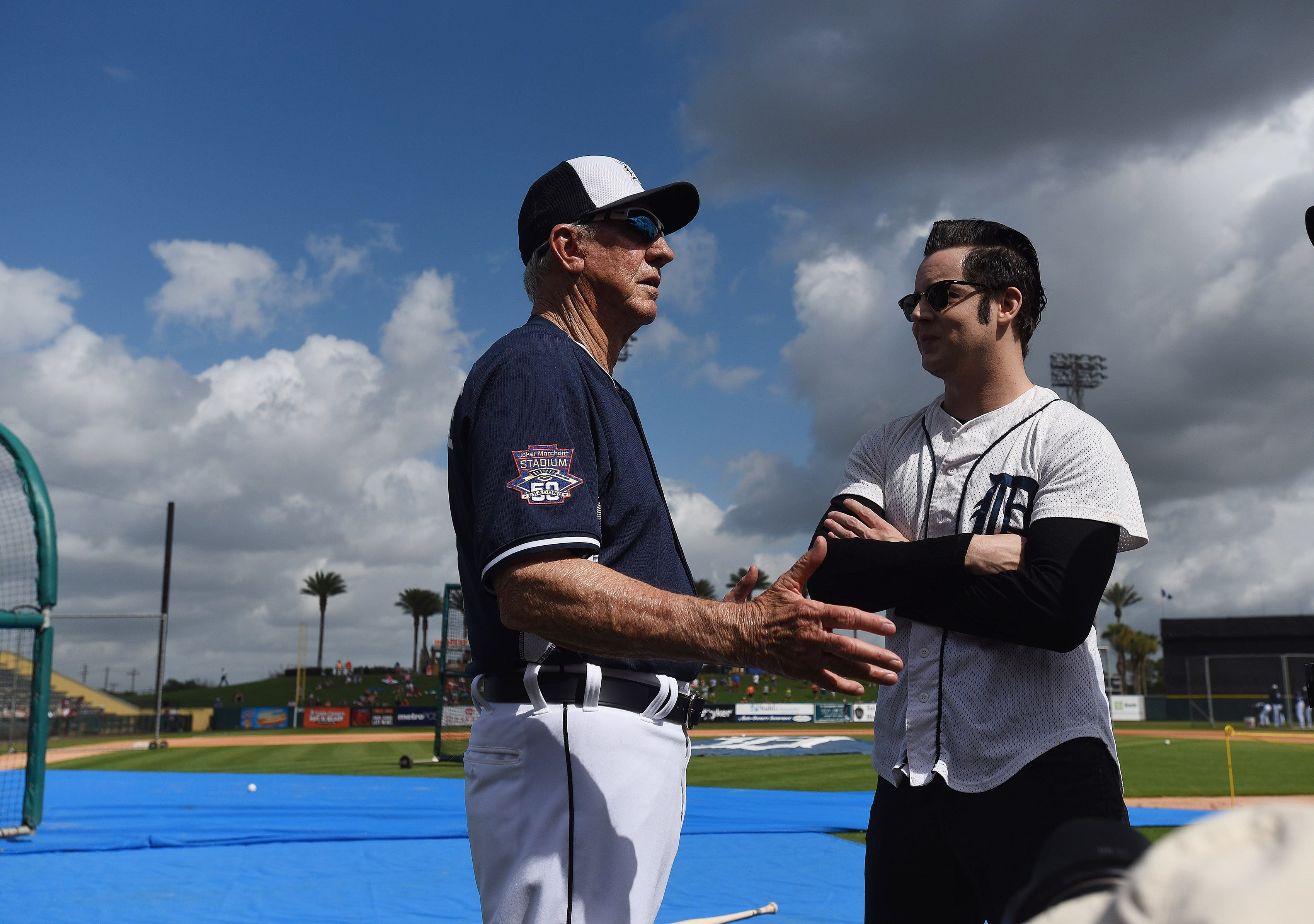Musician Jack White, right, talks with Al Kaline during batting practice before a game against the Atlanta Braves at Joker Marchant Stadium in Lakeland, Fla. on Mar. 5, 2015.