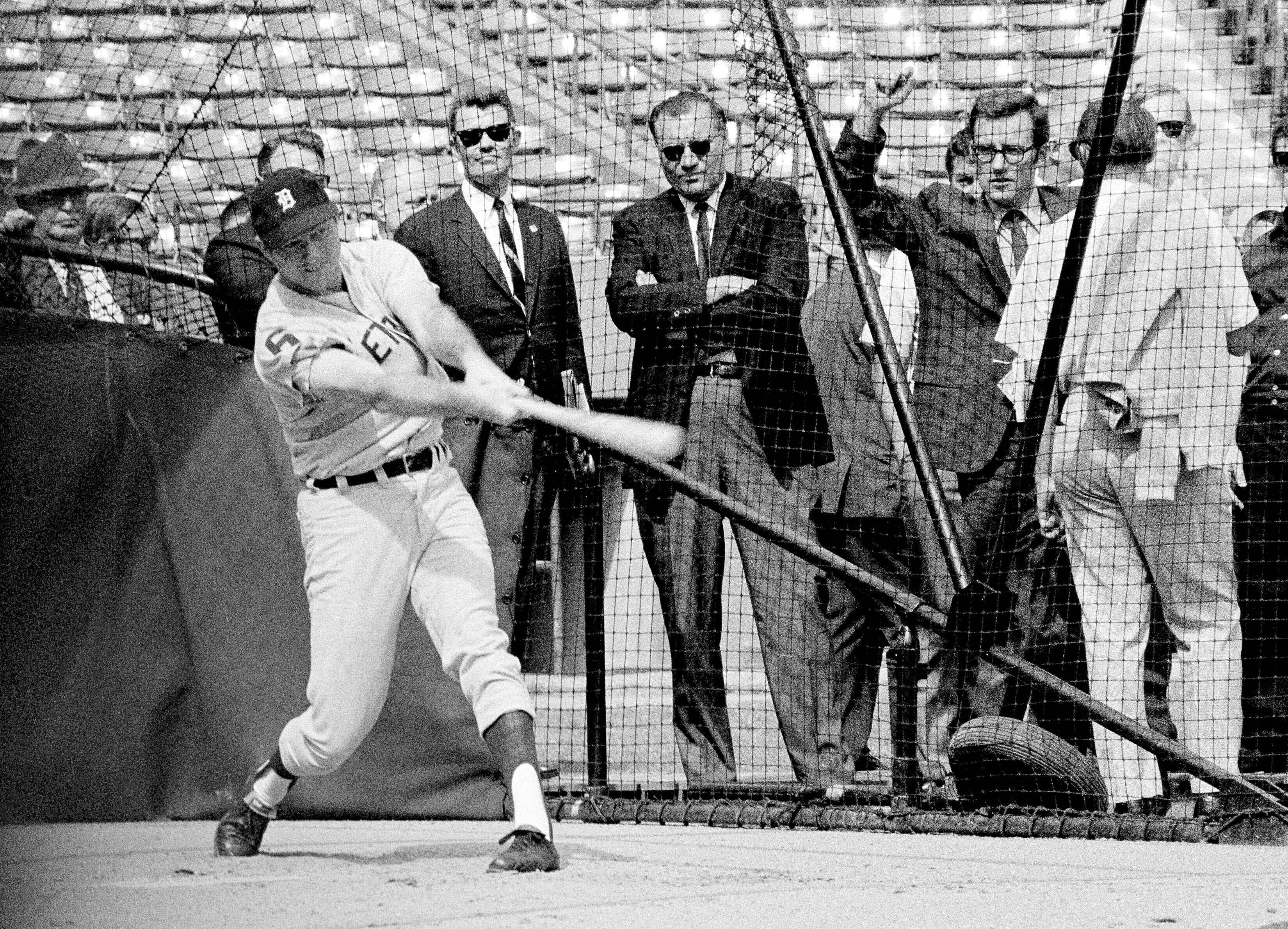 Tigers outfielder Al Kaline swings away in the batting cage at Busch Stadium in St. Louis on Oct. 1, 1968, as he worked out for the World Series opener against the Cardinals.