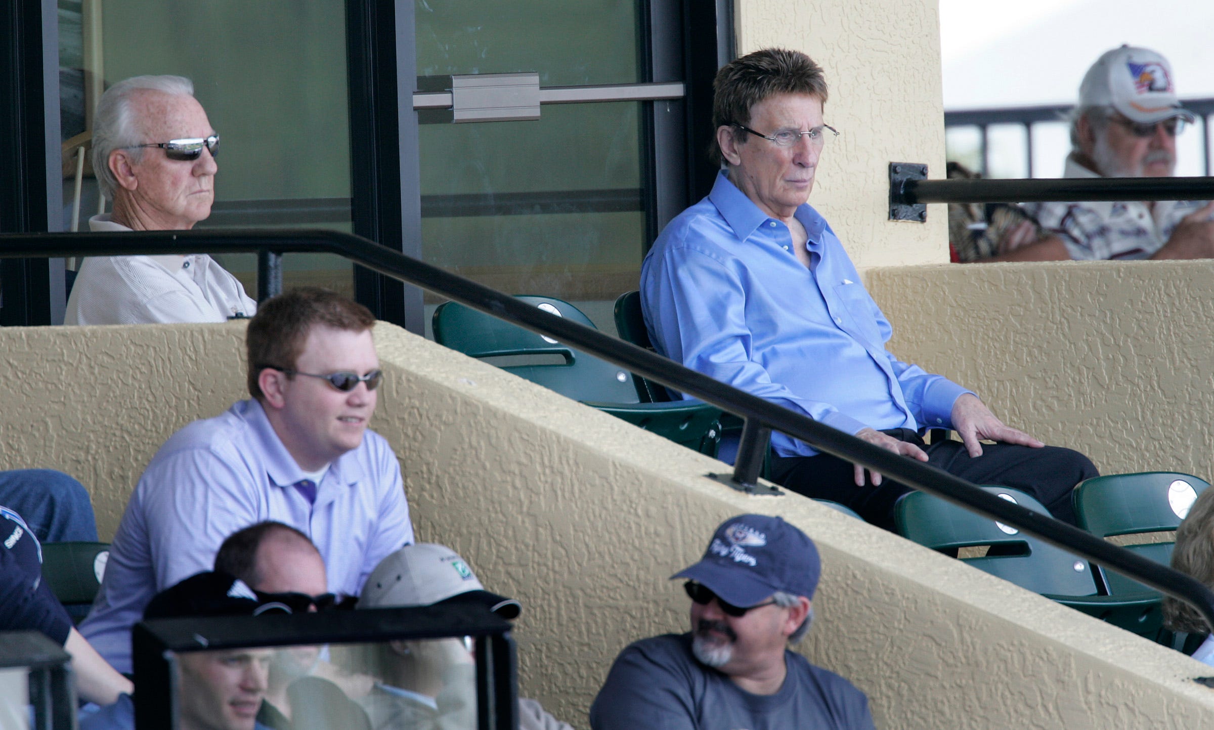 Tigers owner Mike Ilitch, right, watches the game with Al Kaline, far left,  as the Detroit Tigers take on the Atlanta Braves at Joker Marchant Stadium in Tampa, Fla. on March 7, 2007.