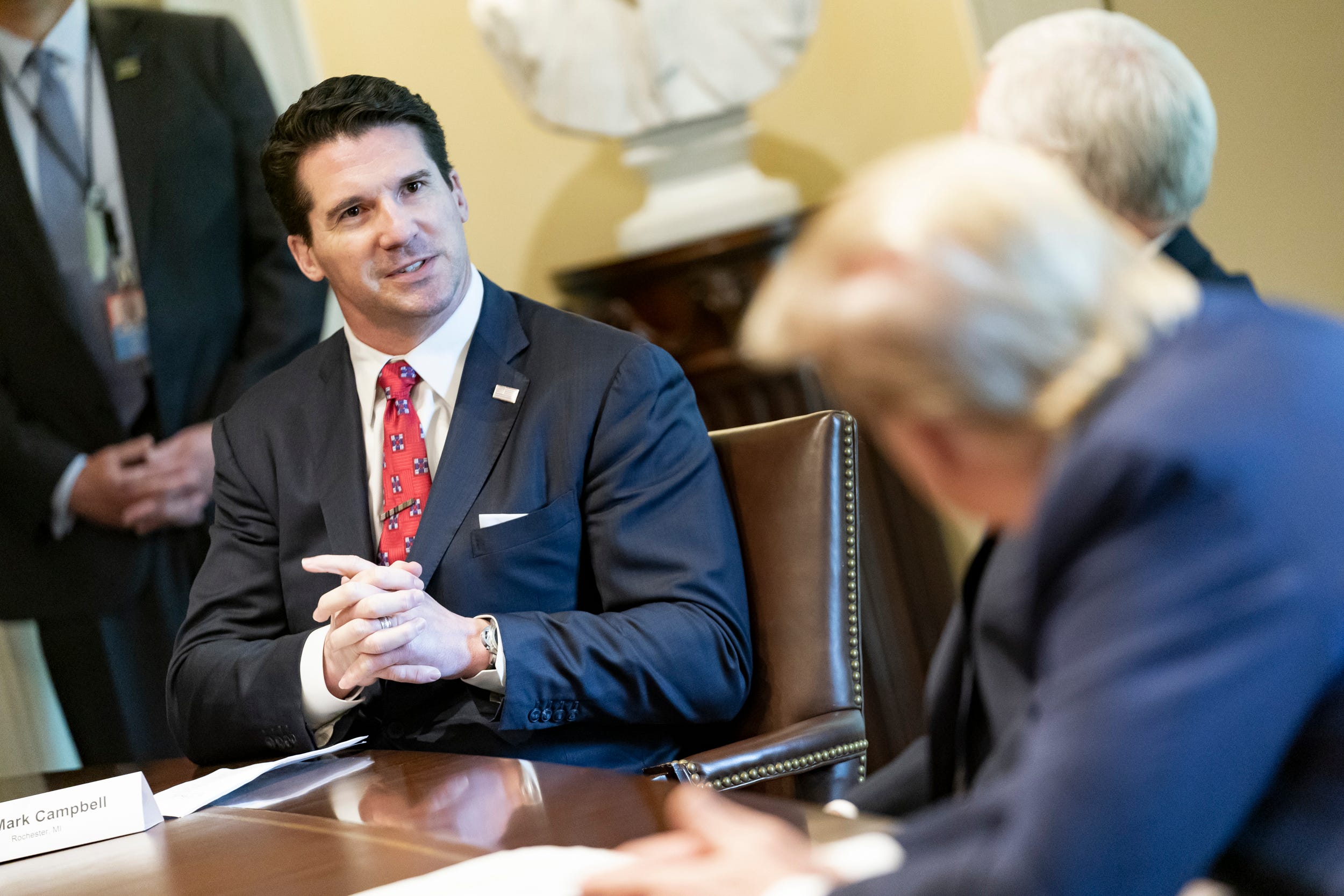 Former University of Michigan football player Mark Campbell, of Rochester, spoke Tuesday with President Donald Trump about his recovery from COIVD-19 in the Cabinet Room of the White House on April 14, 2020.