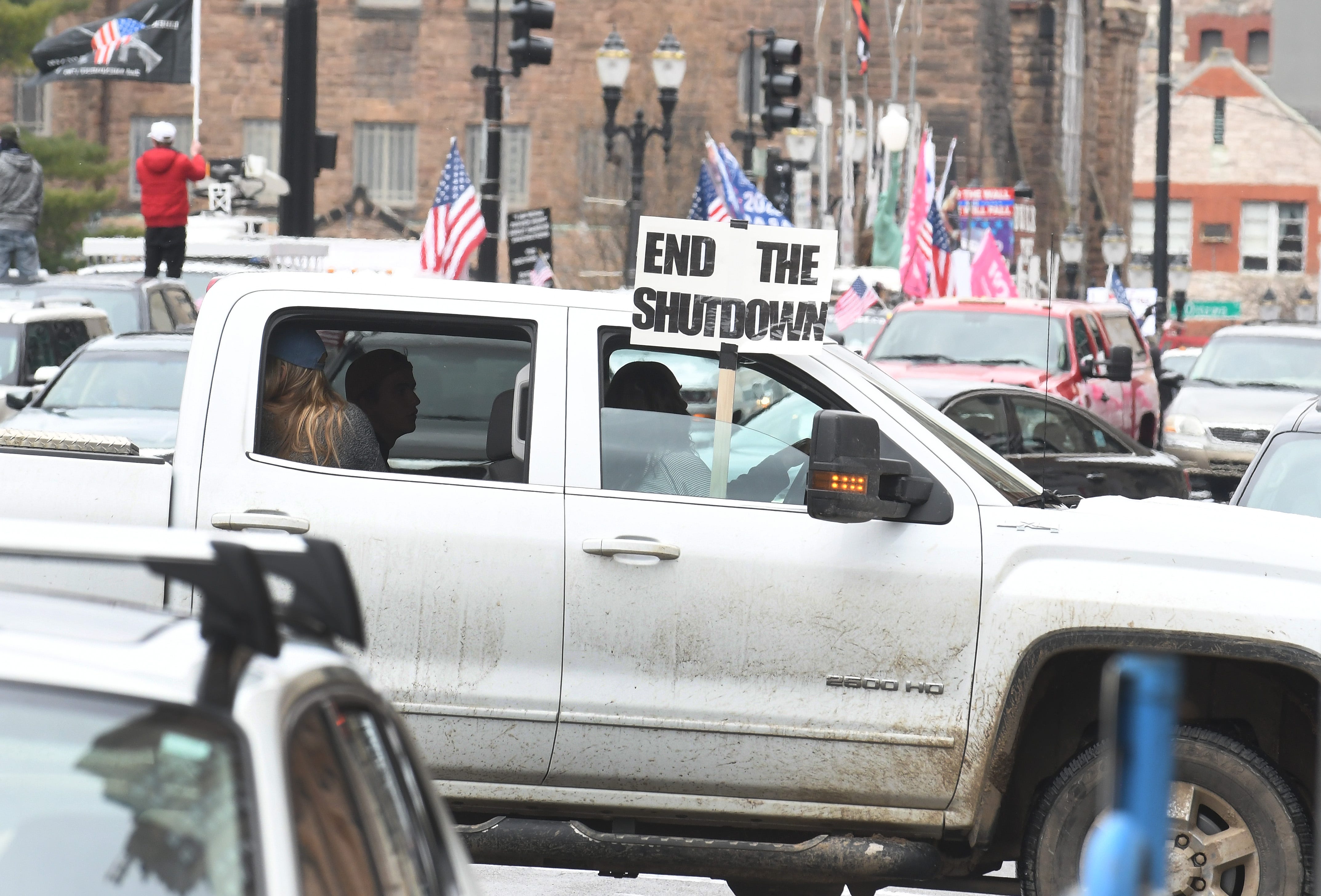 Protesters, in their cars and on foot, surround the state Capitol during Operation Gridlock in Lansing on Wednesday.