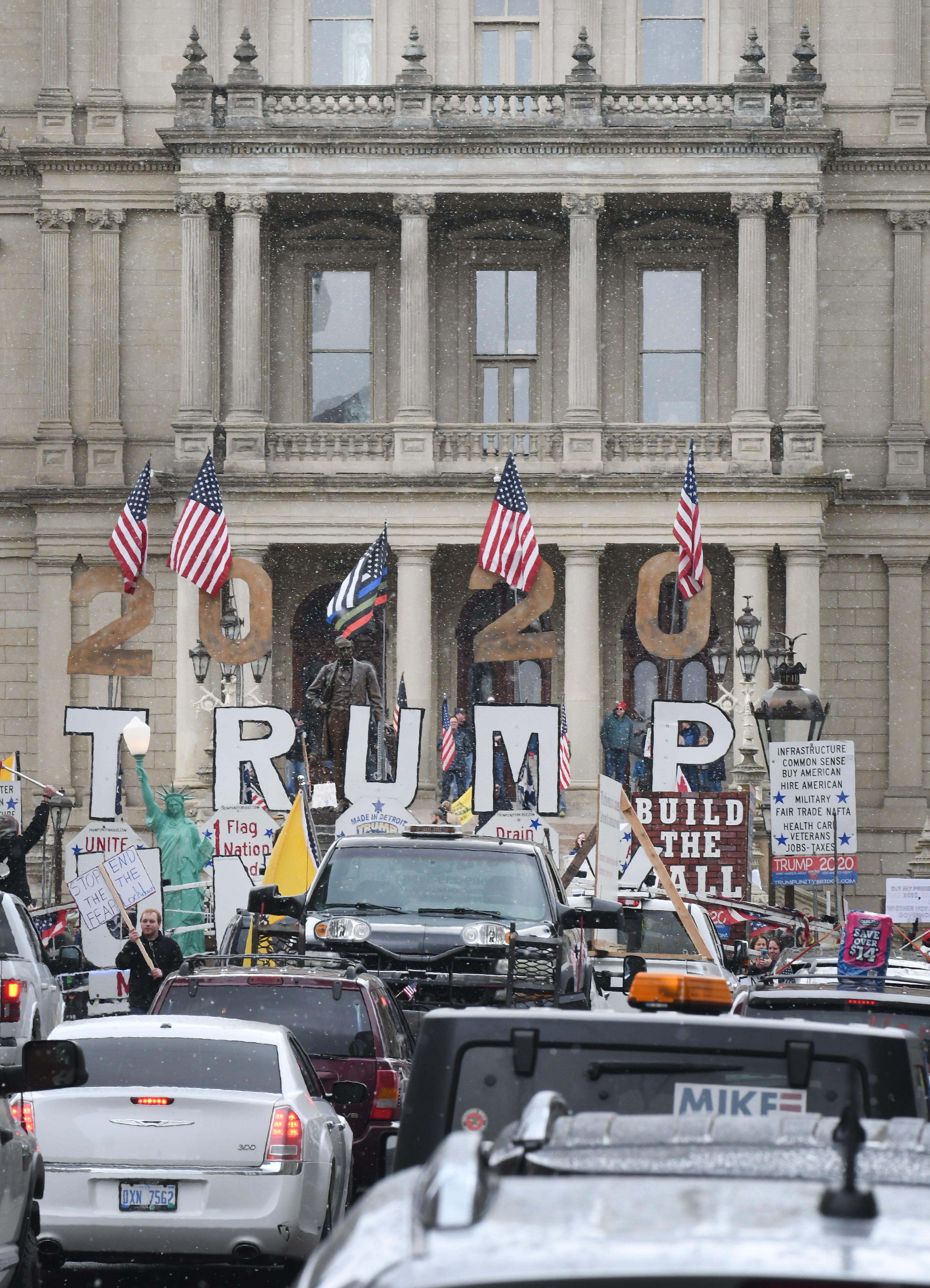 The Trump Unity Bridge pulls up in front of the Michigan State Capitol in Lansing during "Operation Gridlock."