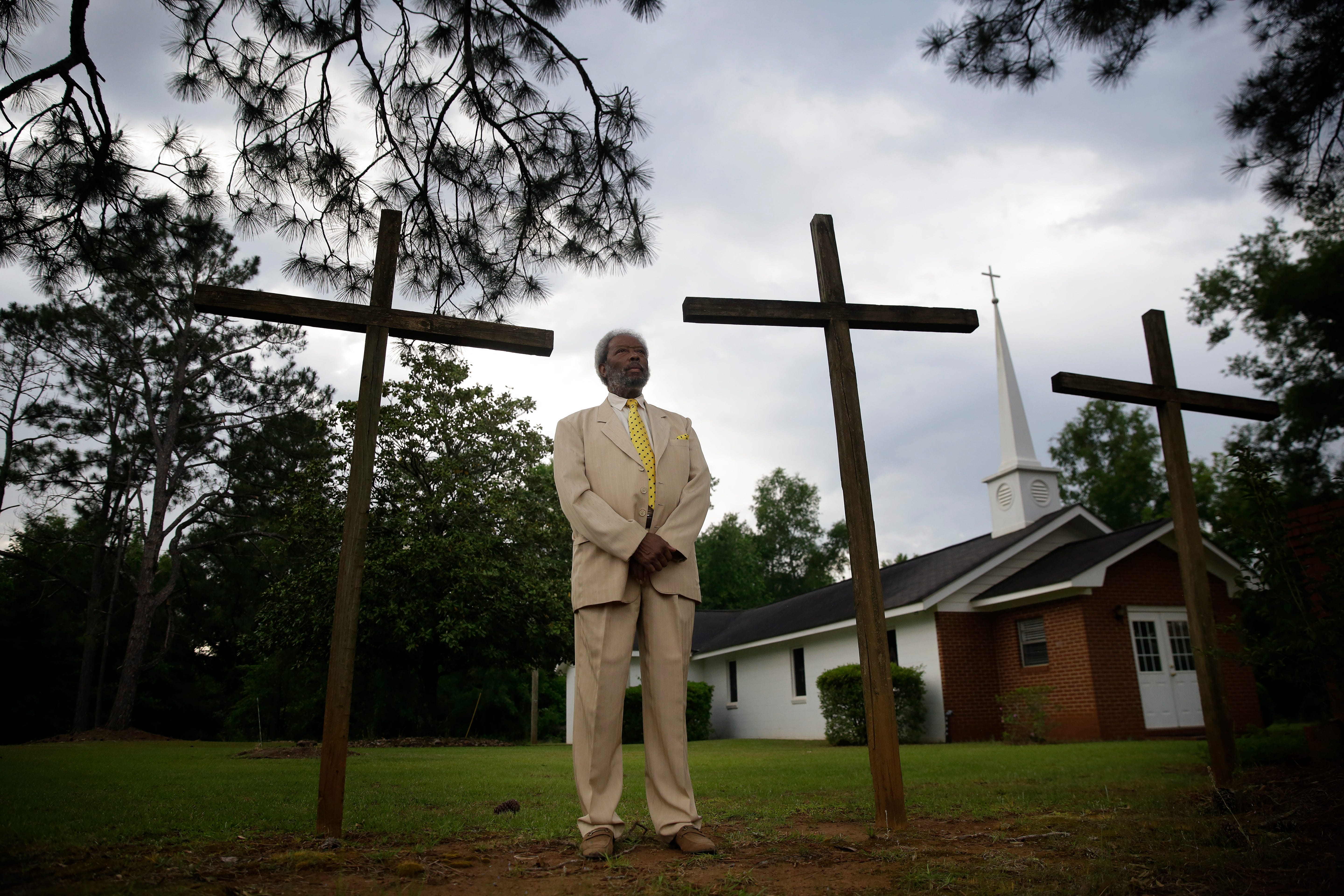 Eddie Keith, 65, of Dawson, Ga., poses for a portrait outside of his church on Sunday, April 19, 2020, in Dawson, Ga. Keith lost his pastor to COVID-19. Keith has worked at Albritten's Funeral Service for around 35 years and was the person to retrieve his pastor. He felt like he'd lost a brother. "Why God? Why God? Why God?" Keith thought as he retrieved his pastor.