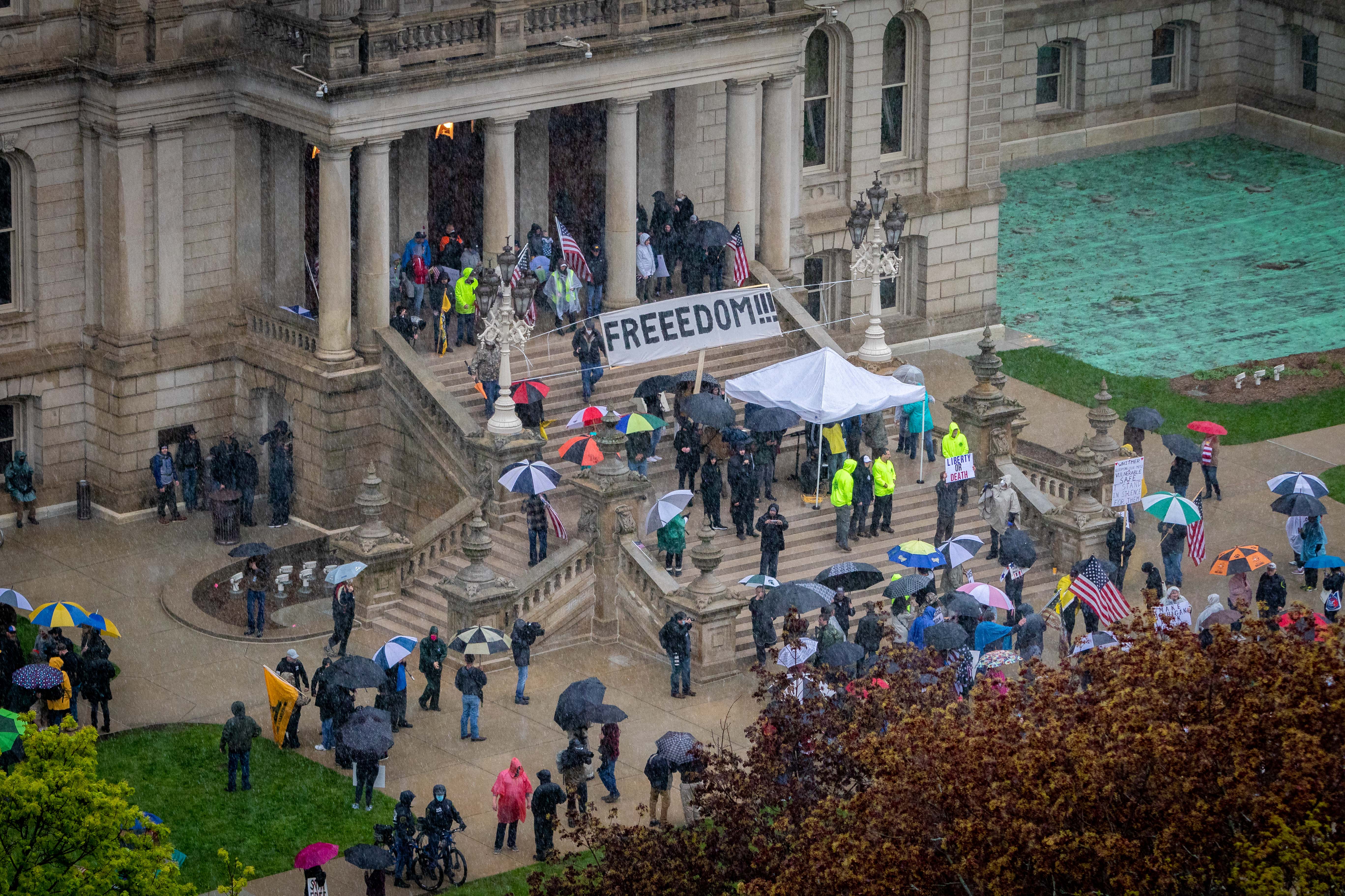 Protesters descend on the Michigan Capitol building to oppose the executive orders Governor Gretchen Whitmer issued in response to the coronavirus pandemic.