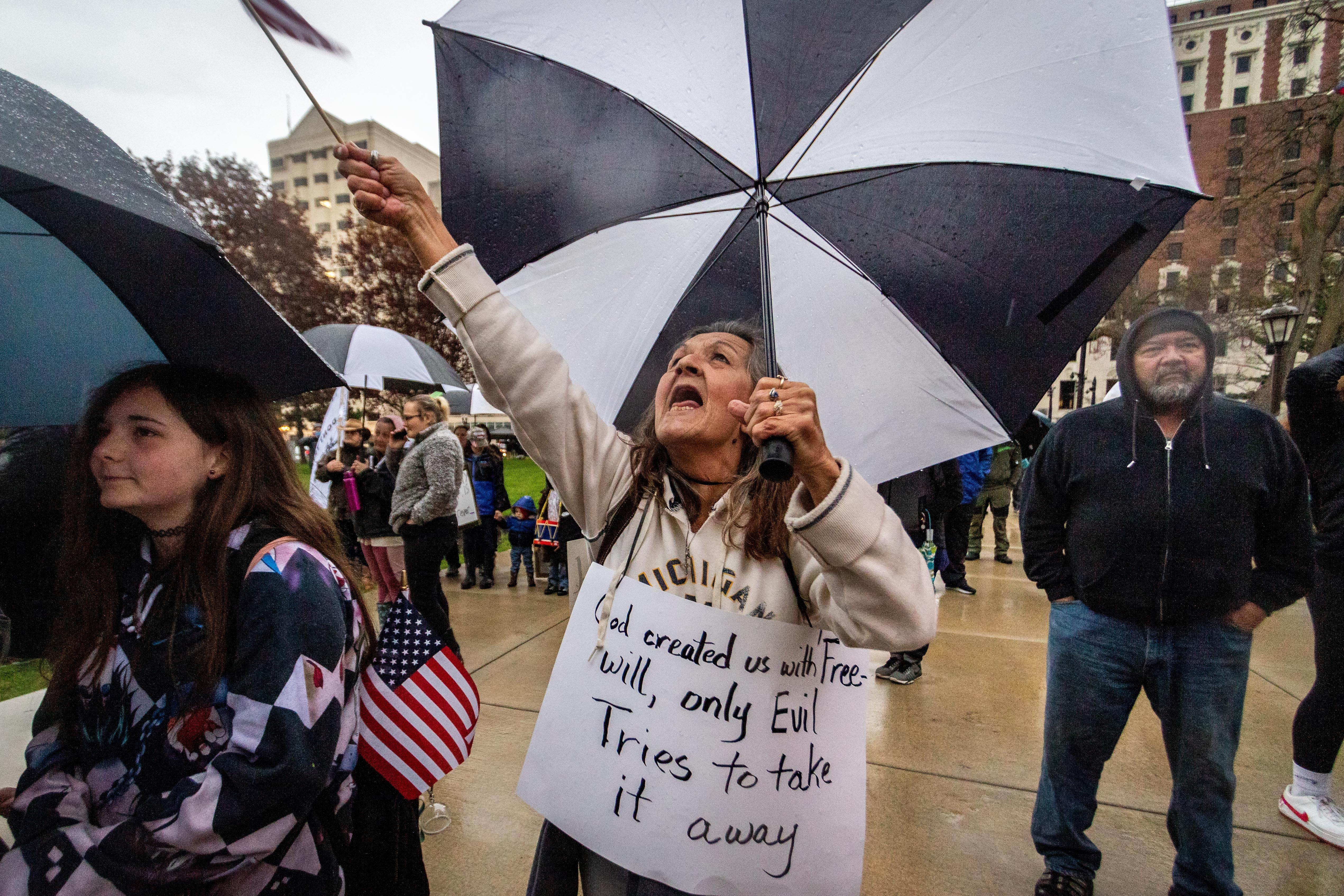 Daleleen (she would only give her first name) of White Pigeon, Michigan yells during a protest at the state Capitol to oppose the executive orders Governor Gretchen Whitmer issued in response to the coronavirus pandemic.