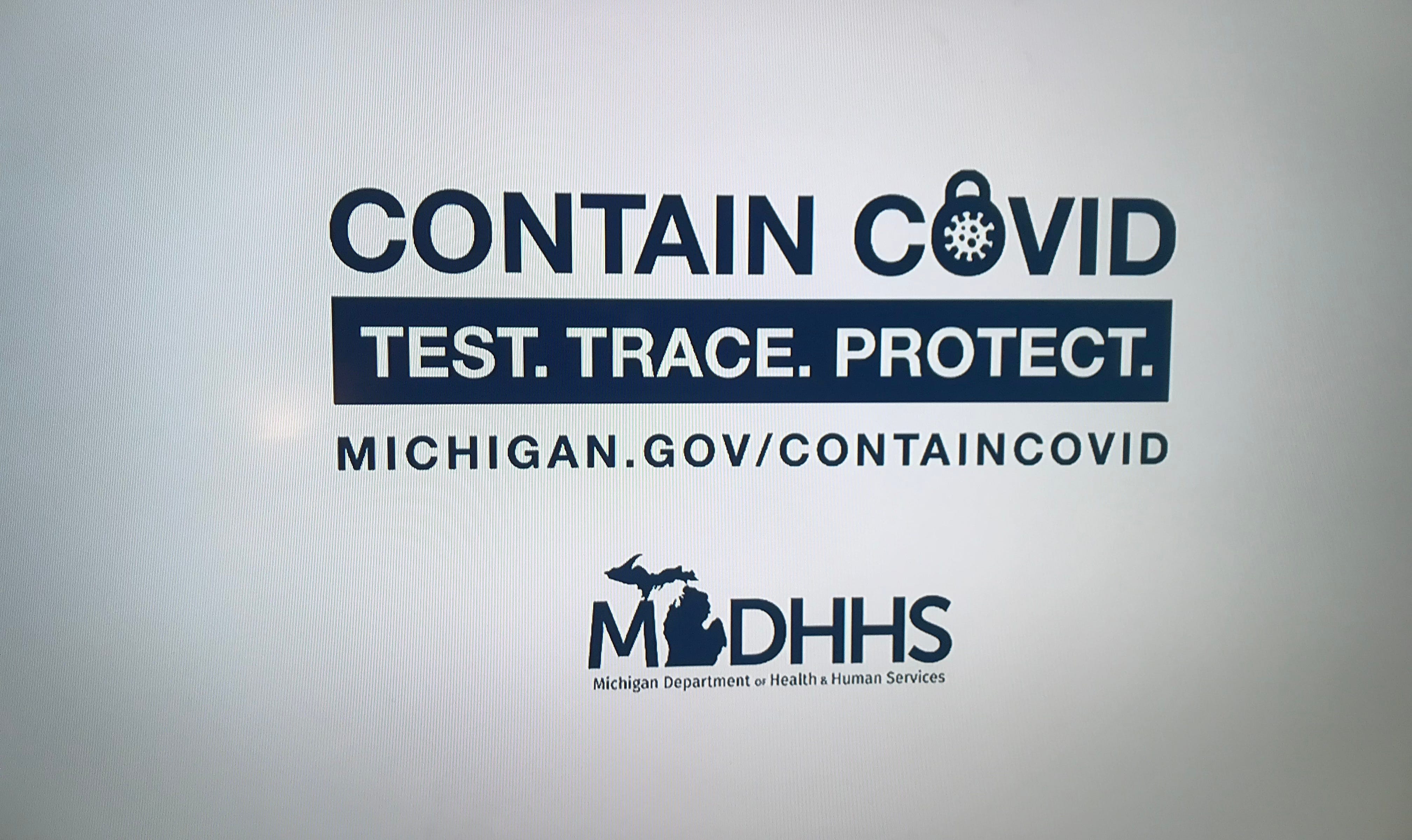 A television advertisement informs viewers about Michigan's contact-tracing program for trying to stem the spread of COVID-19.