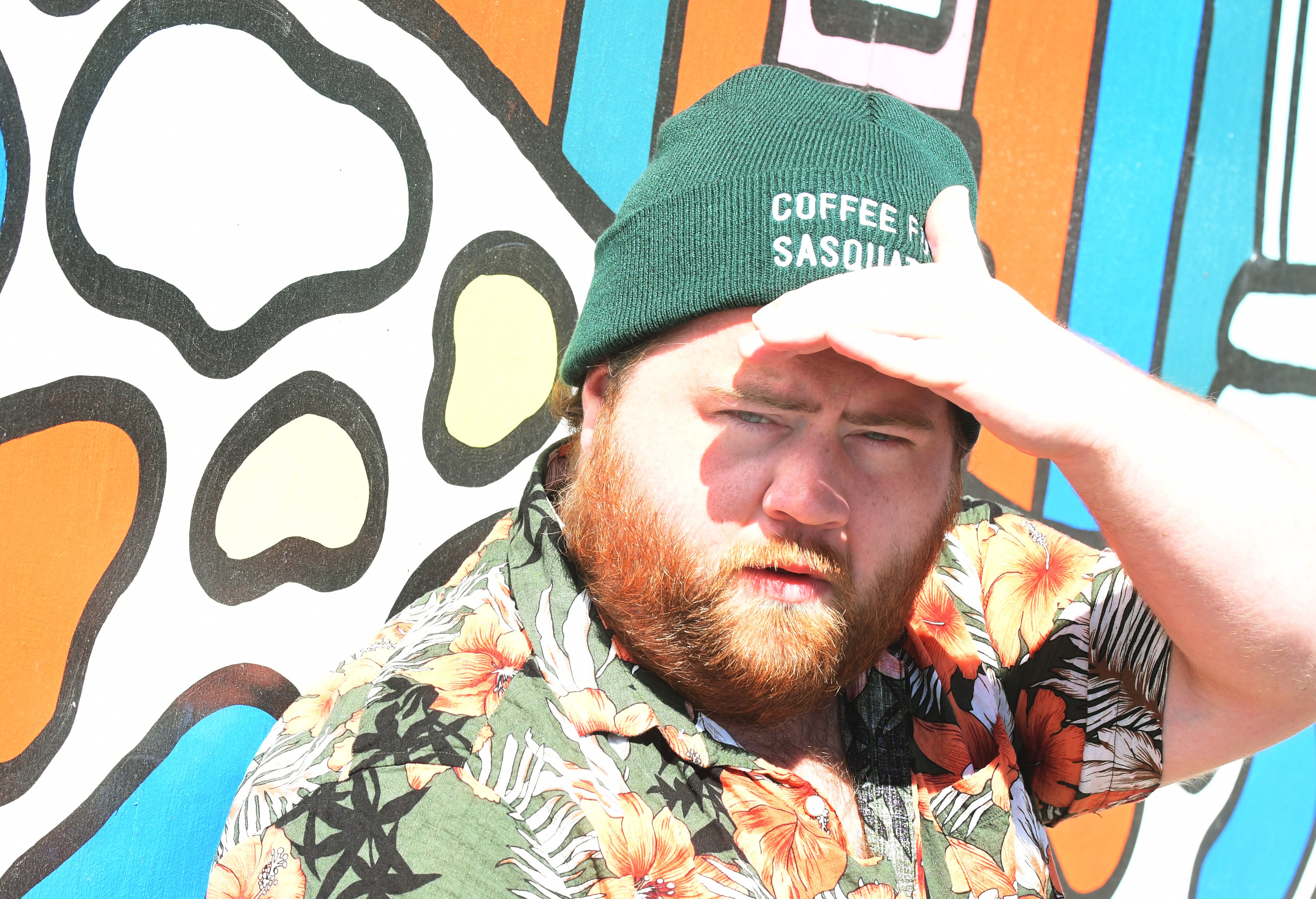 Actor Paul Walter Hauser, in front of a mural by artist Sydney Veverka, in hometown Saginaw, Michigan on June 9, 2020.