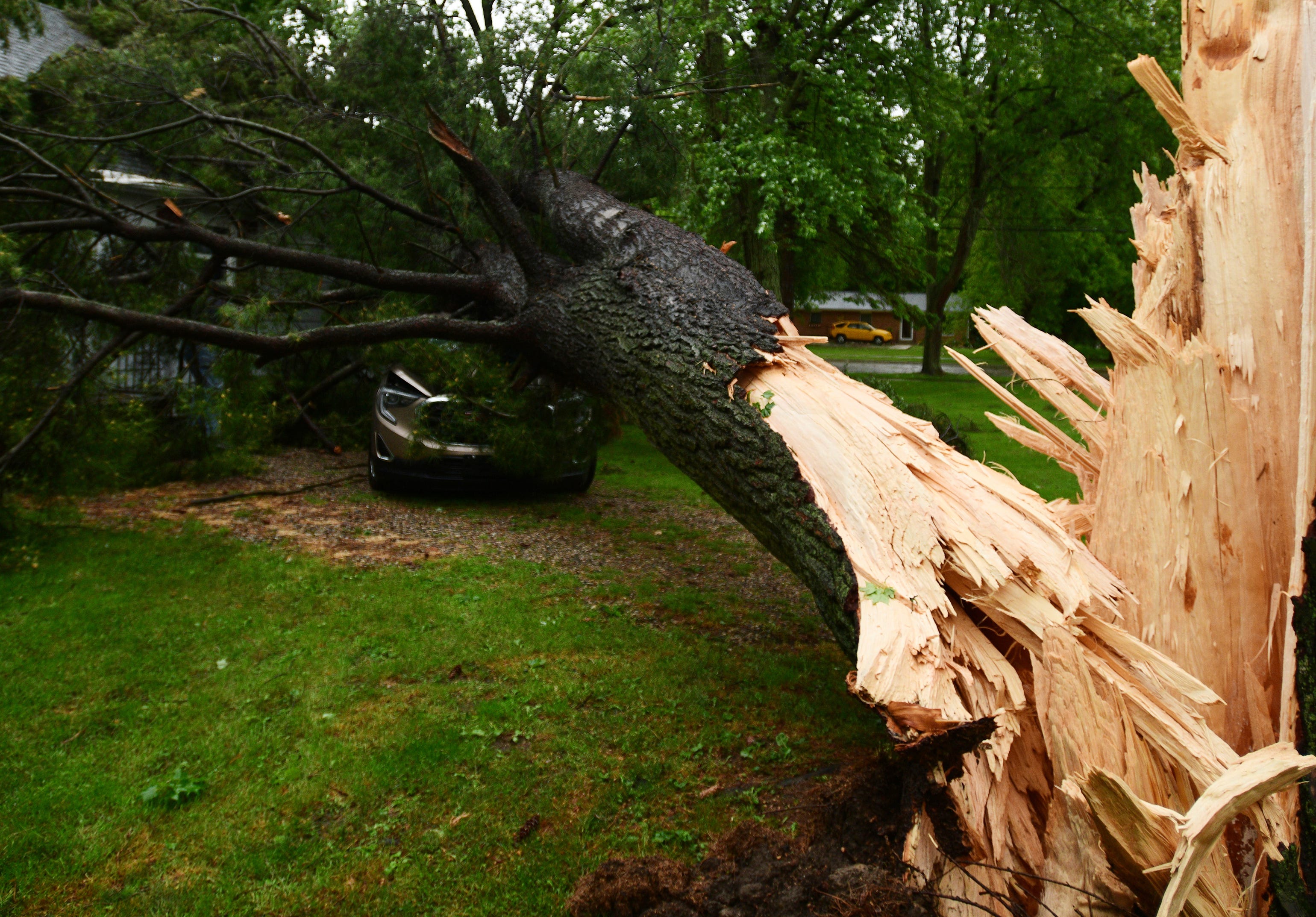 Storm damage is seen at a home on Main Street in Concord, Mich., on Wednesday, June 10, 2020. Strong storms with heavy winds swept across Jackson County causing power outages, downing trees and damaging property.