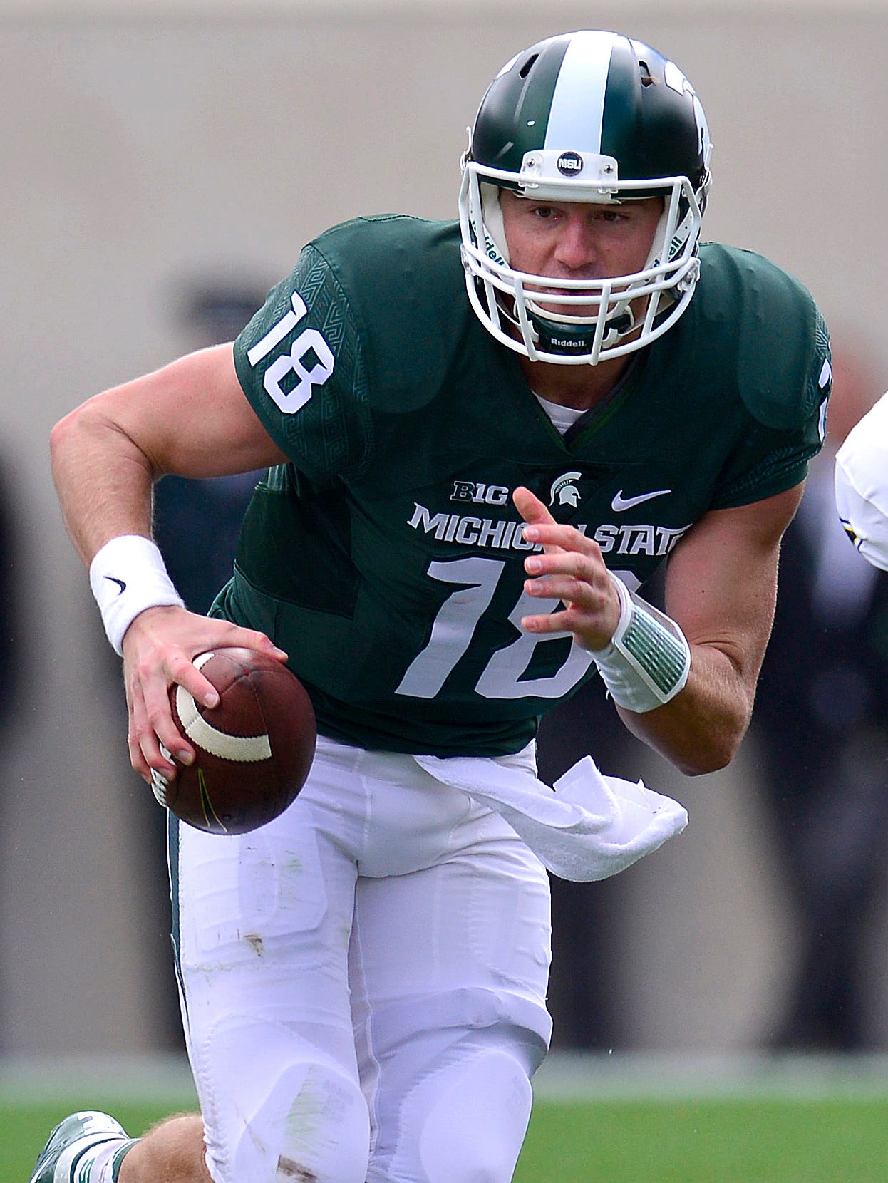 QUARTERBACK – Connor Cook, 2012-15: The winningest quarterback in program history was at the helm during one of the most successful stretches at Michigan State and certainly within the last quarter of a century. While leading MSU to a pair of Big Ten championships and a spot in the College Football Playoff, Cook threw for more yards (9,194) and touchdowns (71) than anyone in program history and earned first-team All-Big Ten honors as a senior.