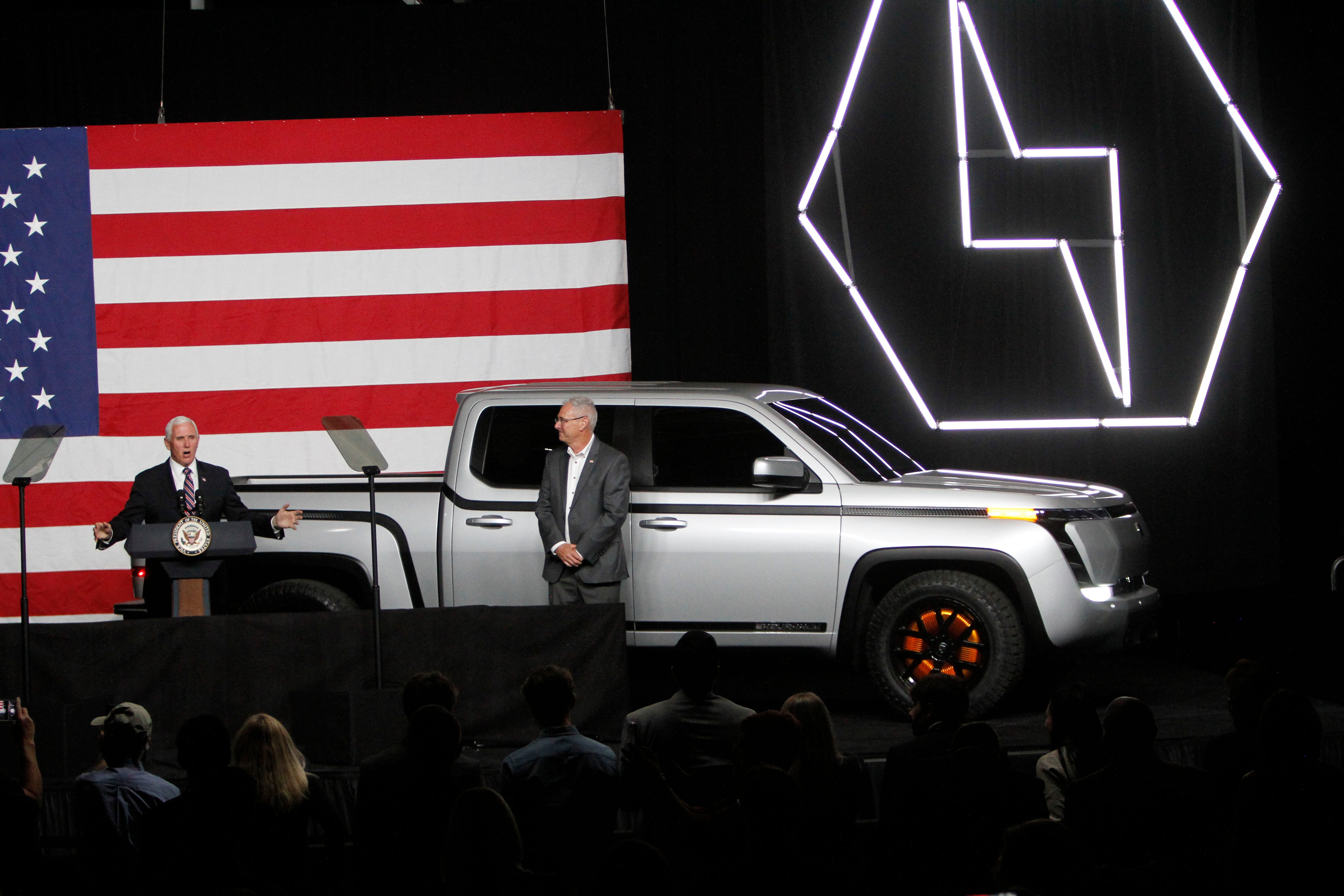 Vice President Mike Pence delivers a speech with Lordstown Motors President and CEO Steve Burns looking on during the unveiling of the Lordstown Motors' electric truck, Endurance, Thursday in Lordstown, Ohio.
