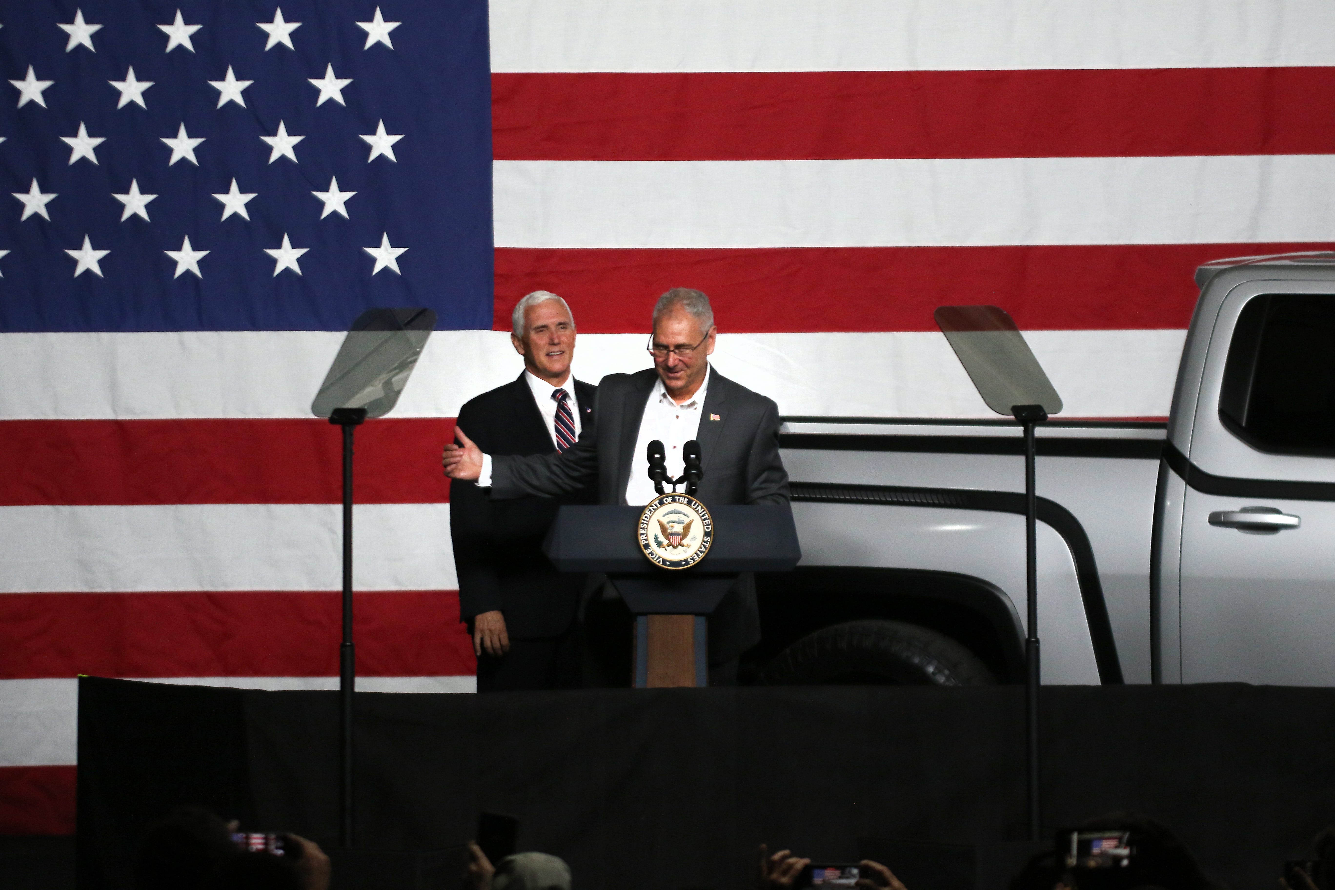 Lordstown Motors president and CEO Steve Burns stands on stage with Vice President Mike Pence during the unveiling of the Lordstown Motors' electric truck, Endurance.