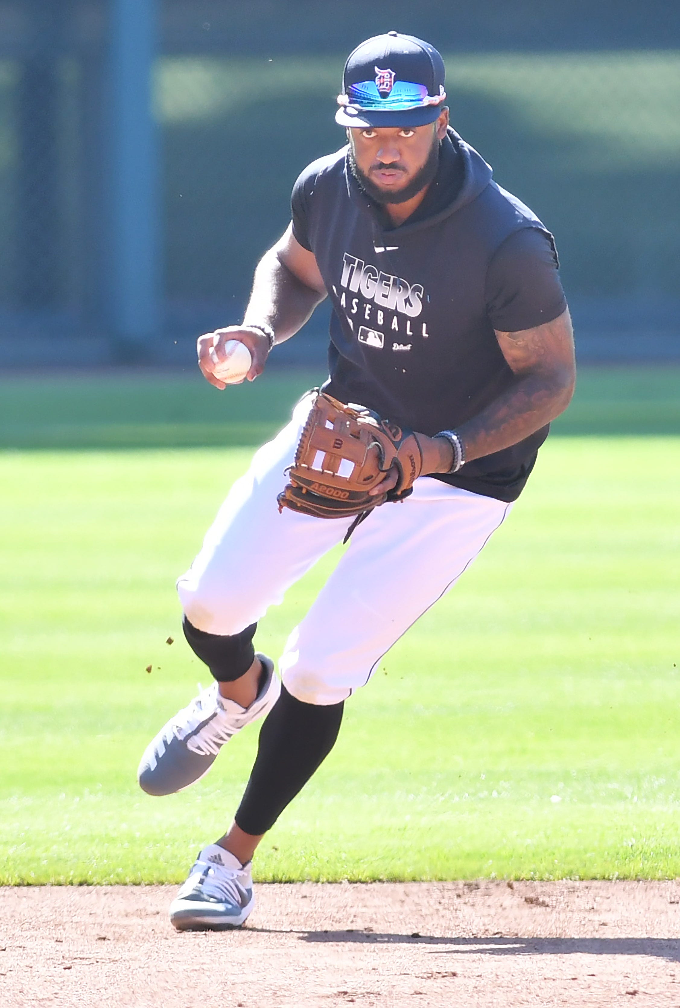 Tigers' Niko Goodrum fields a ground ball at Detroit Tigers Summer Camp at Comerica Park in Detroit on July 14, 2020.