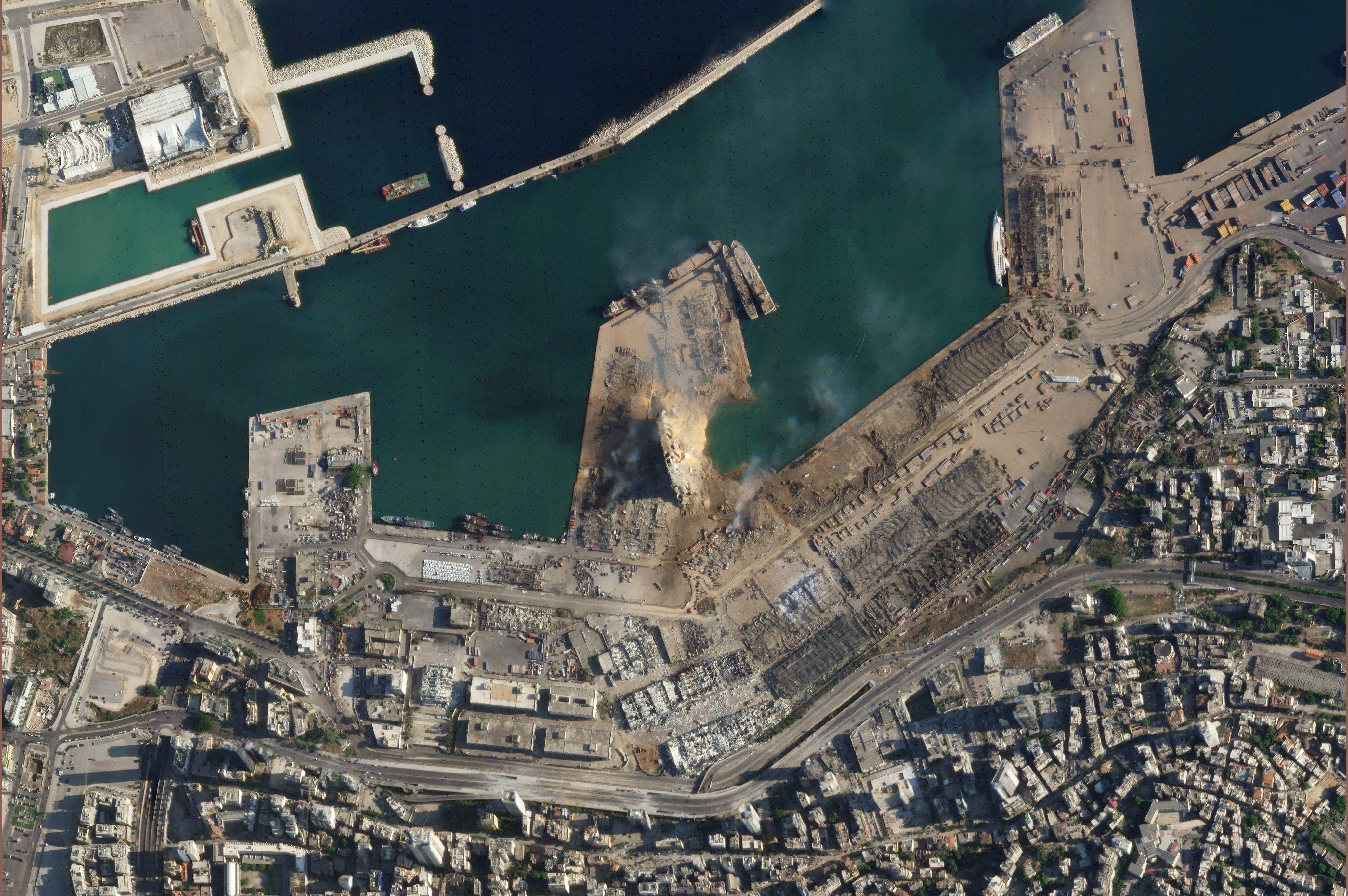This satellite image taken on Wednesday Aug. 5, 2020 shows the port of Beirut and the surrounding area in Lebanon following a massive blast on Tuesday. Residents of Beirut confronted a scene of utter devastation a day after a massive explosion at the port rippled across the Lebanese capital, killing at least 100 people, wounding thousands and leaving entire city blocks blanketed with glass and rubble.