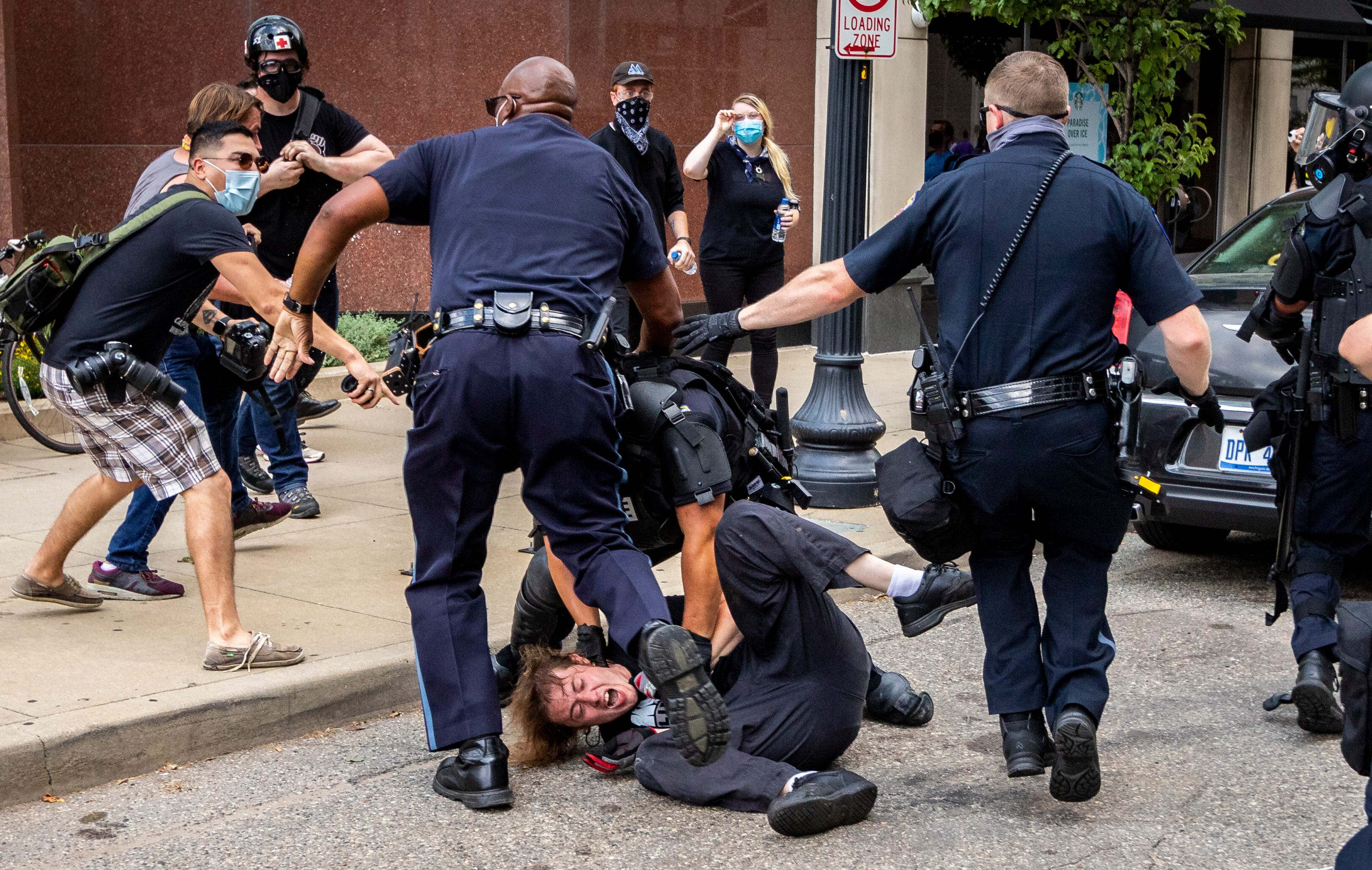 Kalamazoo Police arrest a counter-protestor during a Proud Boys march.