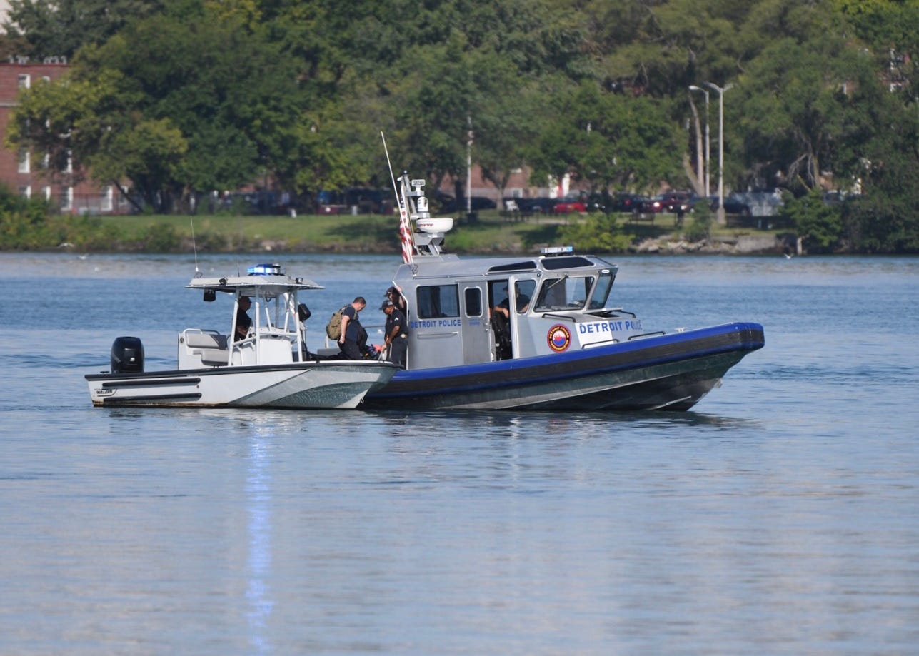 The Detroit Police continue to search for a missing person along Belle Isle beach on Saturday, August 22, 2020.