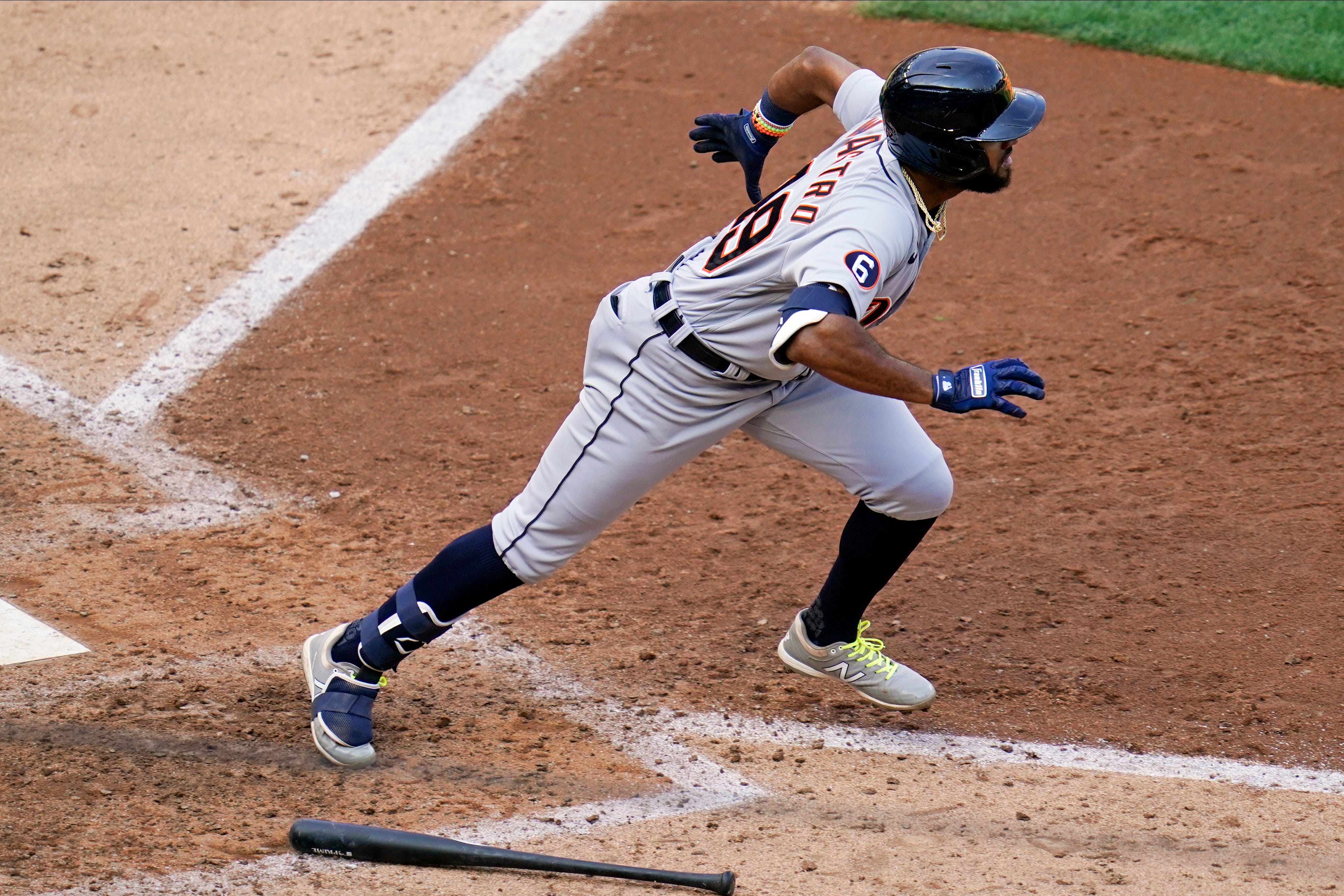 Detroit Tigers' Willi Castro runs to first after hitting an RBI single to tie the baseball game against the Minnesota Twins in the seventh inning.