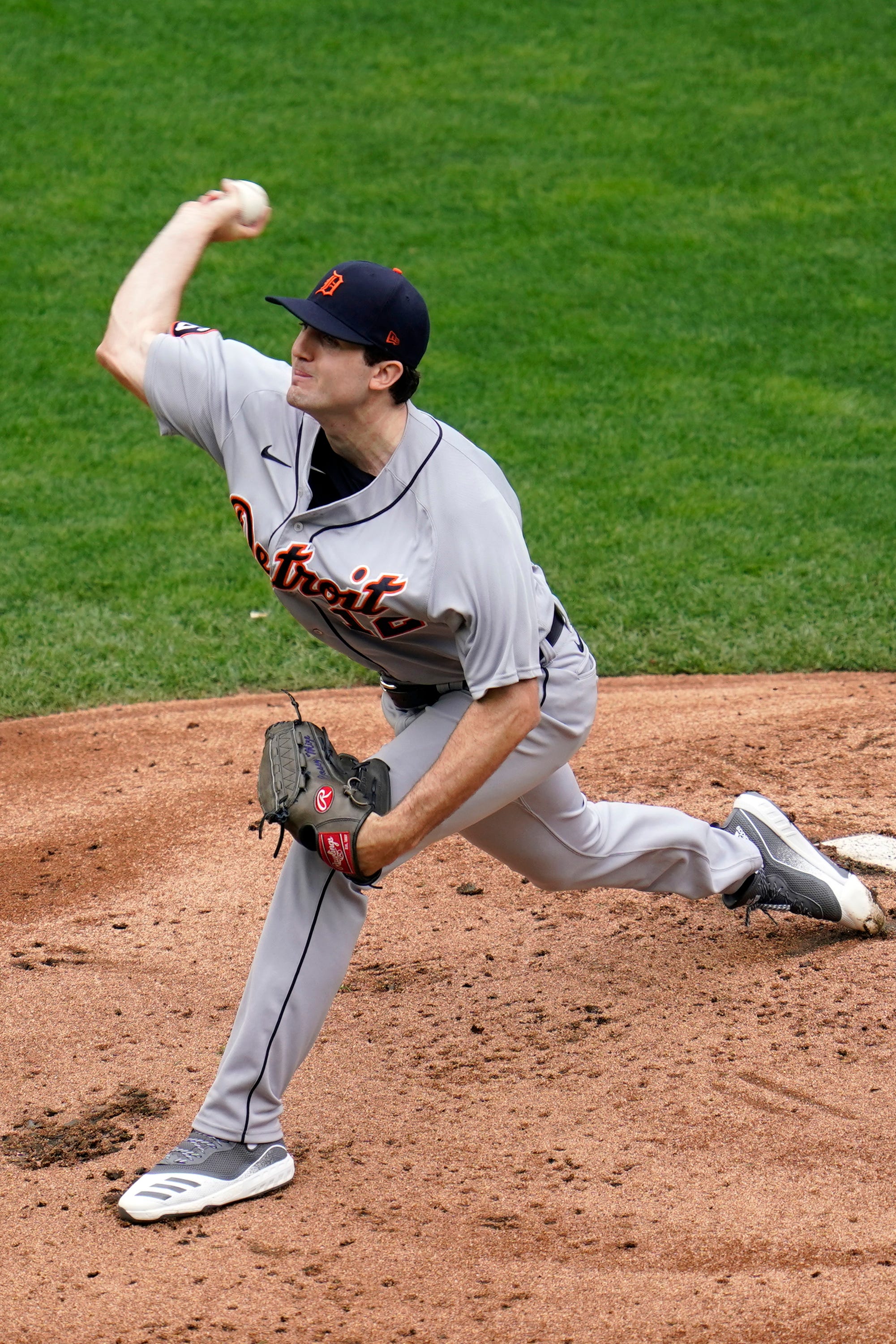 Detroit Tigers ' pitcher Casey Mize throws against the Minnesota Twins in the first inning.