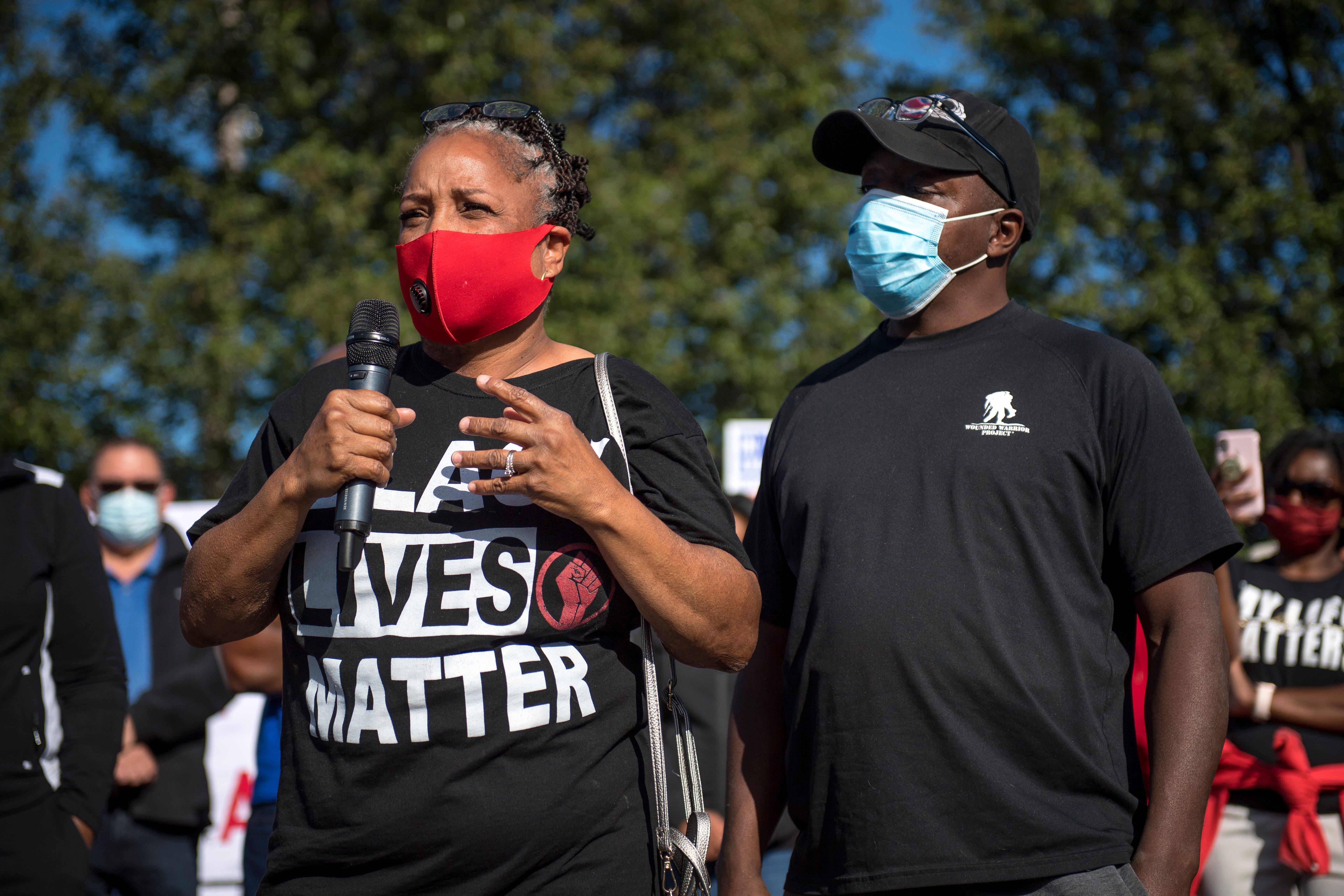 Candace Hall speaks before the March Against Racism in Warren on Sept. 19, 2020. The march in Warren occurred in response to the city called hate crimes against residents Candace Hall, her husband Eddie and their two children.