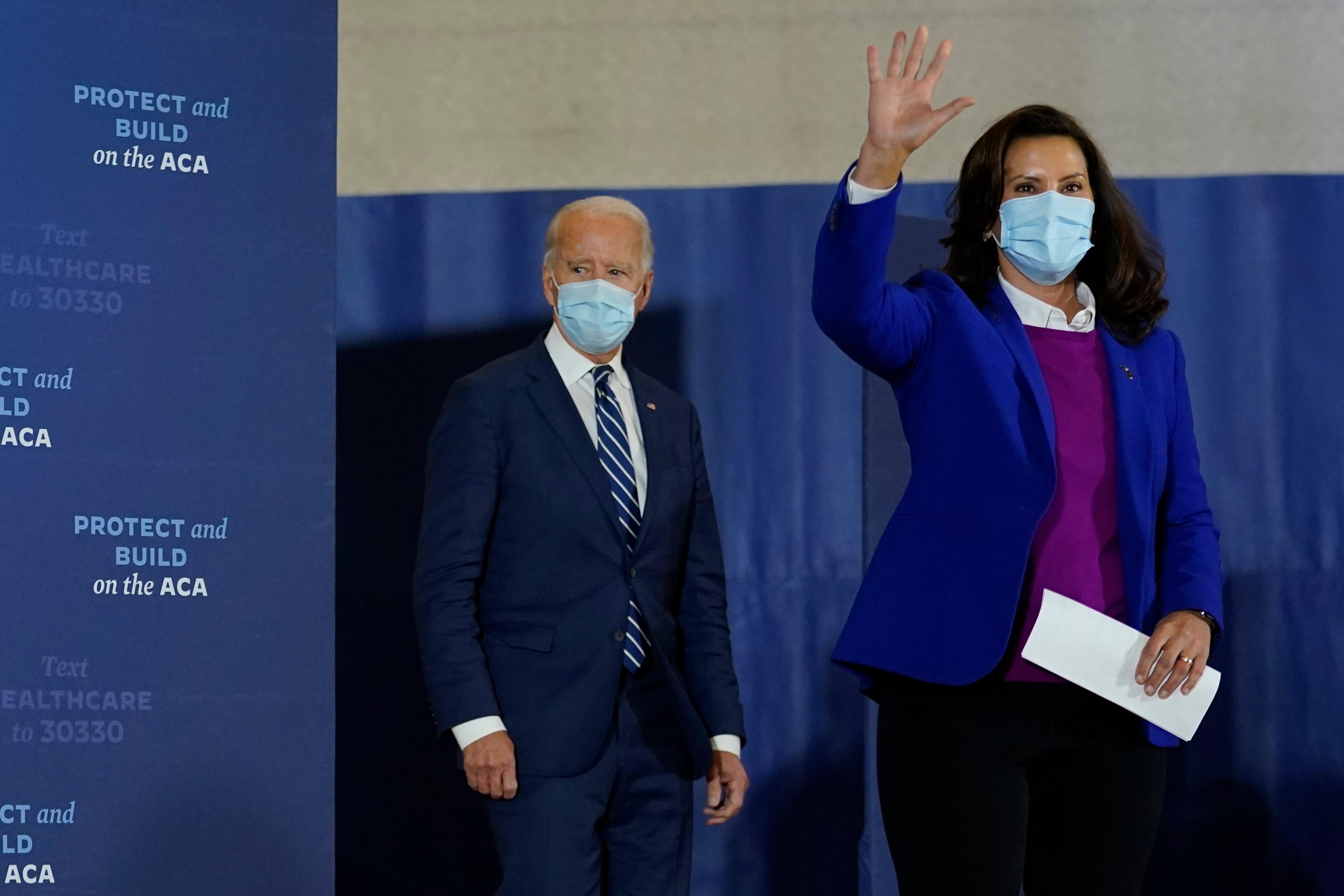 Democratic presidential candidate former Vice President Joe Biden and Michigan Governor Gretchen Whitmer arrive to speak at Beech Woods Recreation Center, in Southfield, Mich., Friday, Oct. 16, 2020.