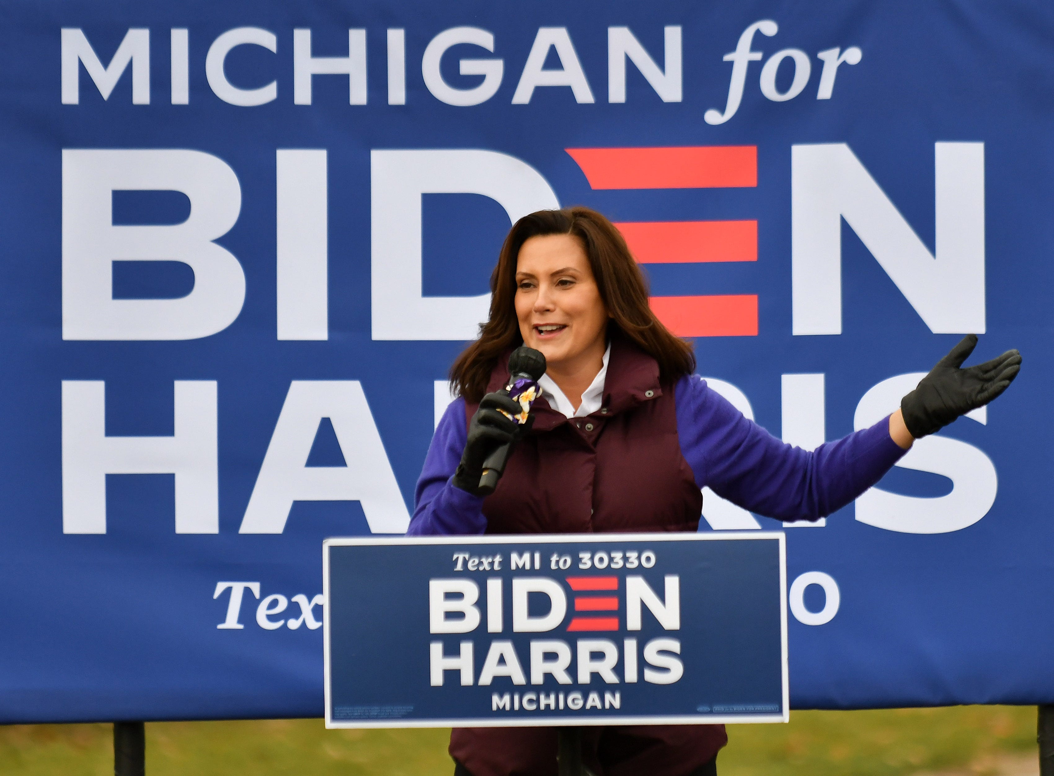 Gov. Gretchen Whitmer speaks before Democratic vice presidential candidate Sen. Kamala Harris at the Canvass Kickoff event at the Troy Community Center in Troy, Mich. in Detroit on Oct. 25, 2020.