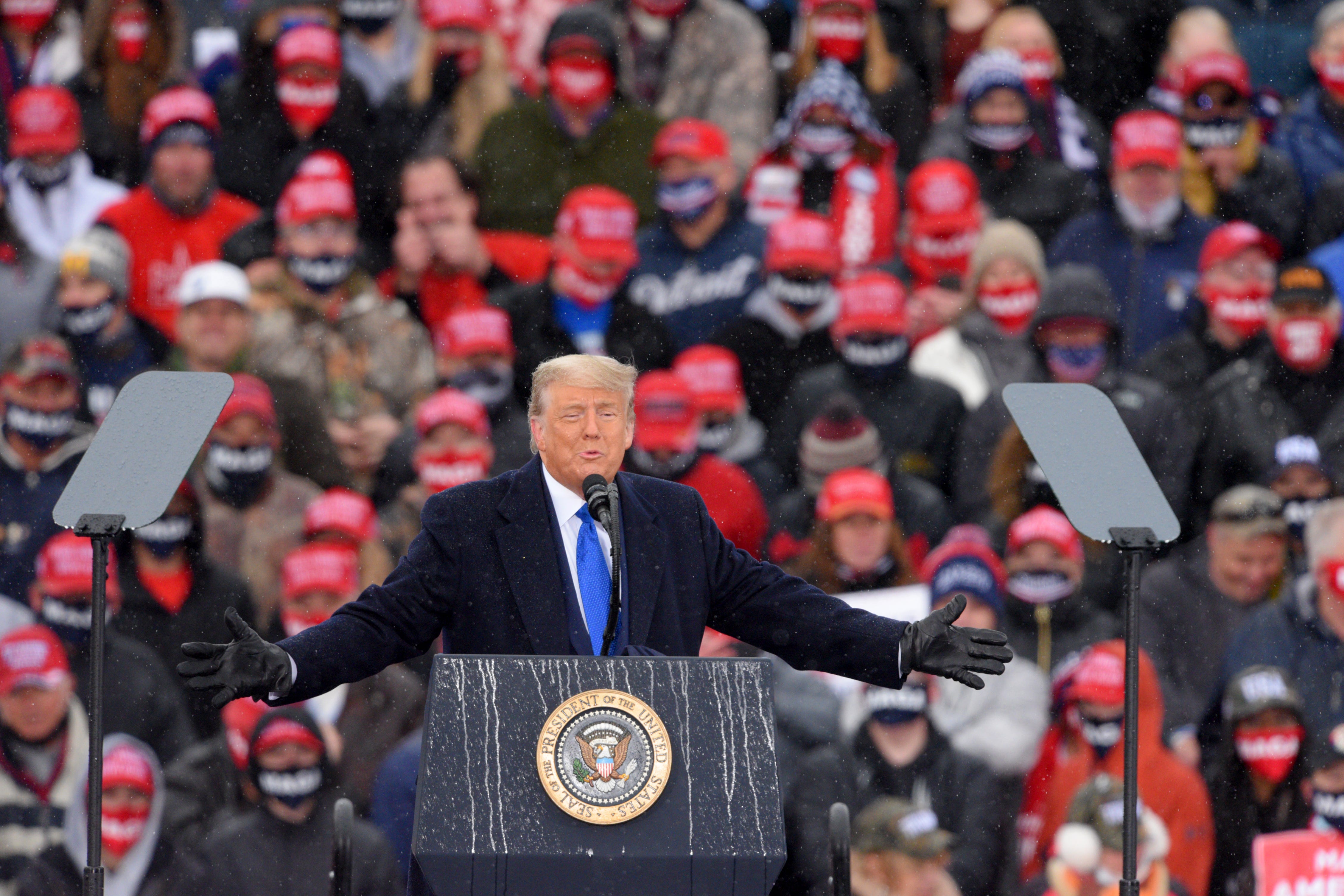 President Donald Trump addresses supporters during his Make America Great Again Victory Rally at AV Flight at the Capital Region International Airport in Lansing, Tuesday, October 27, 2020.