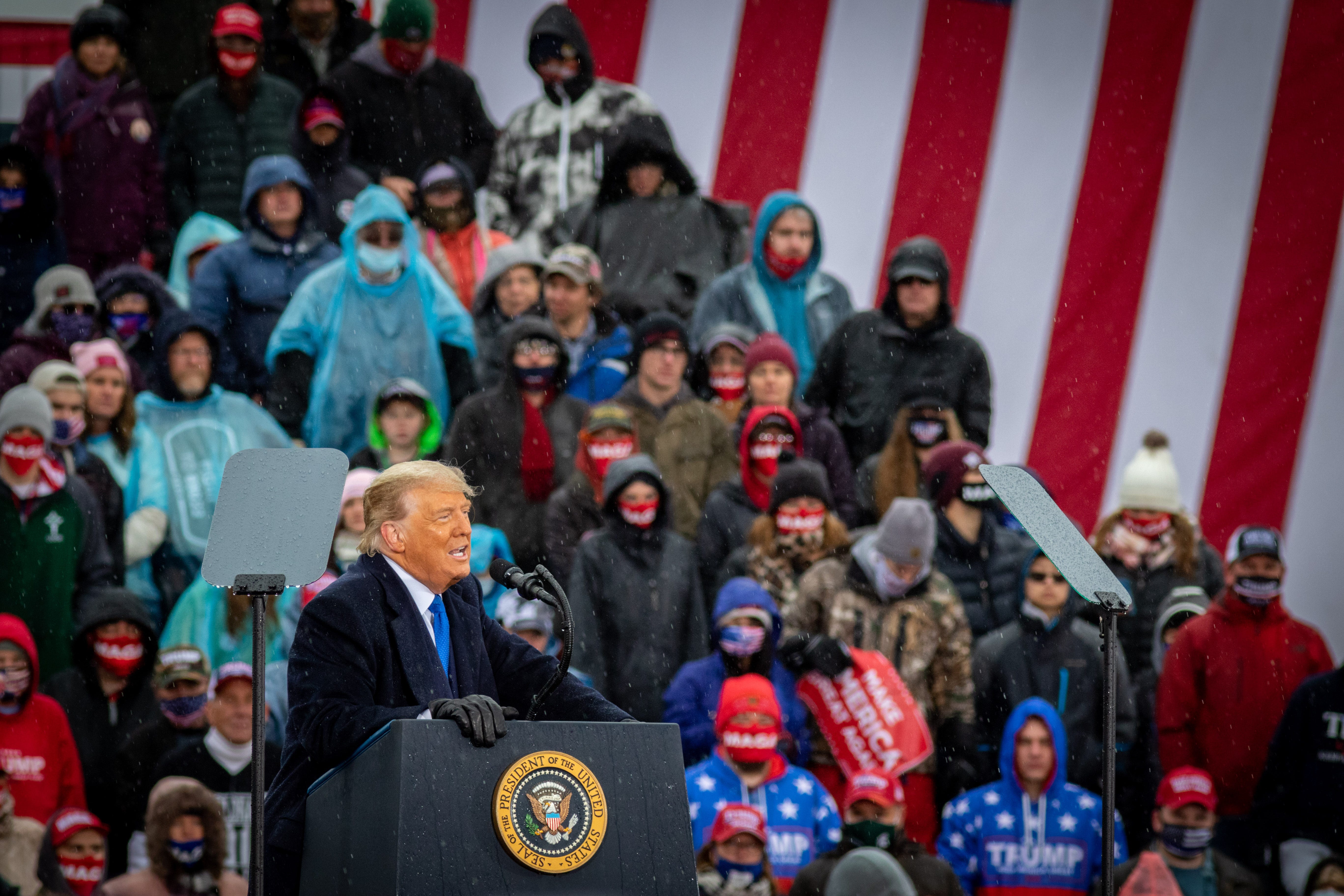 President Donald Trump addresses the crowd during a campaign rally in Lansing, Michigan on October 27, 2020, one week before the general election.