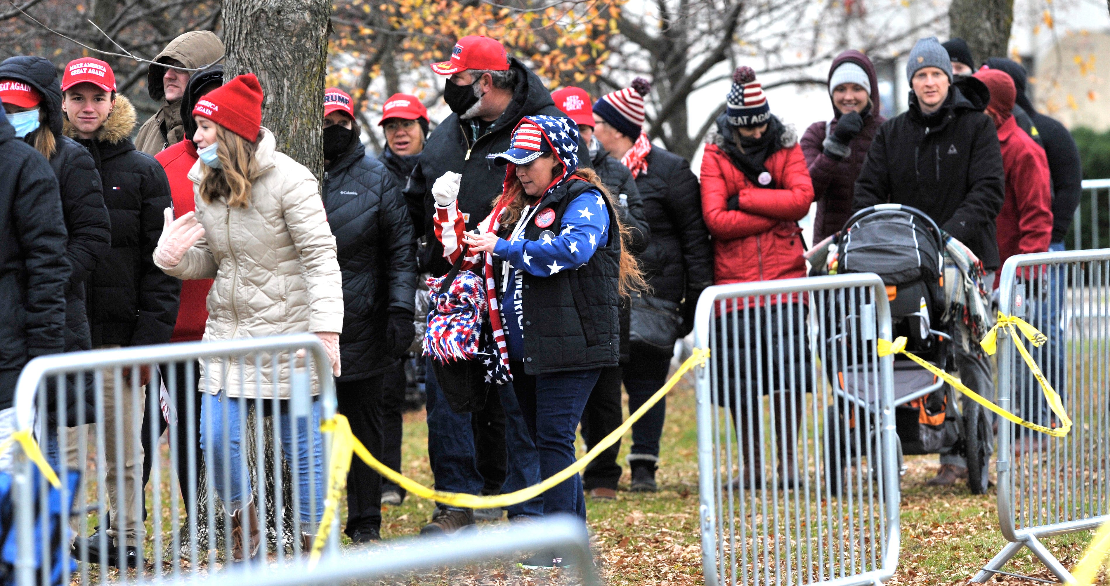 Supporters wait to enter through Secret Service security before U.S. President Donald Trump arrives at the Oakland International Airport in Waterford Twp., Friday, October 30, 2020, for his Make America Great Again Victory Rally.