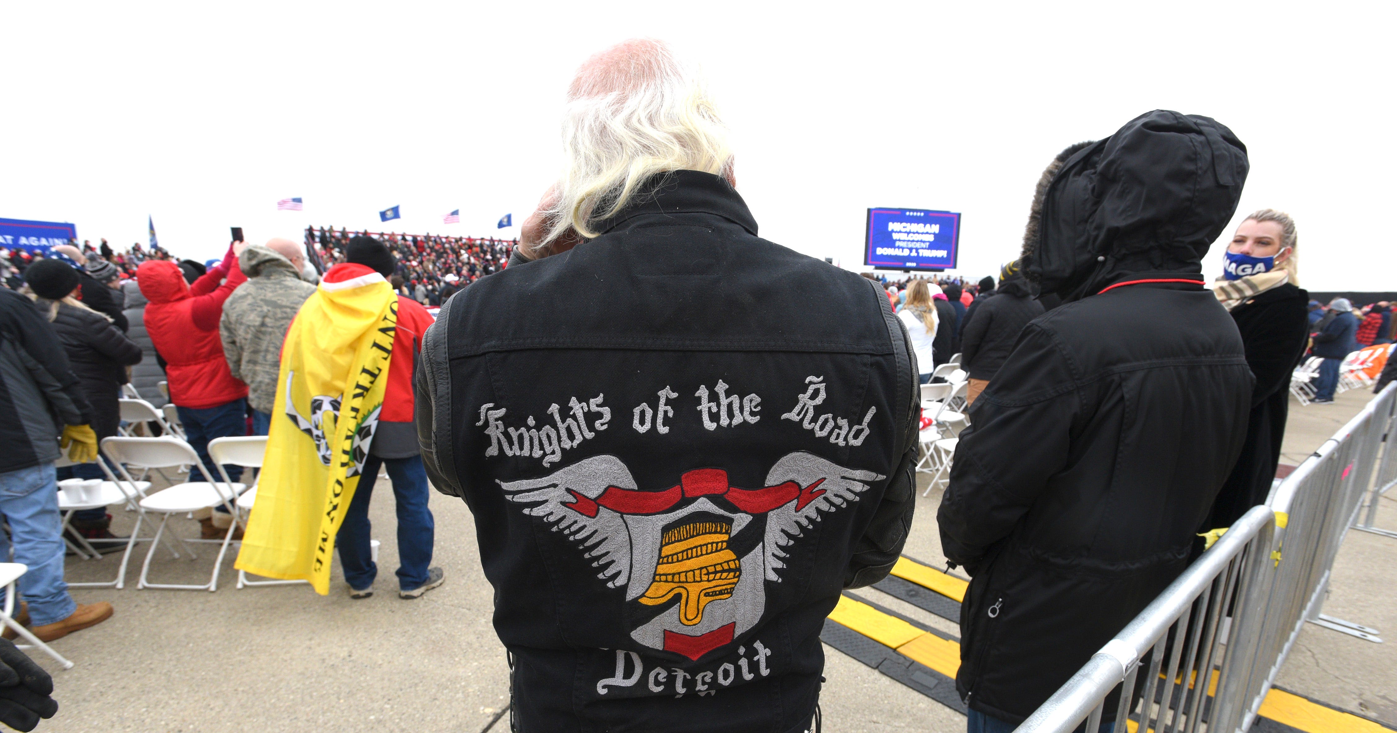 A Knights of the Road Detroit member waits in the crowd.