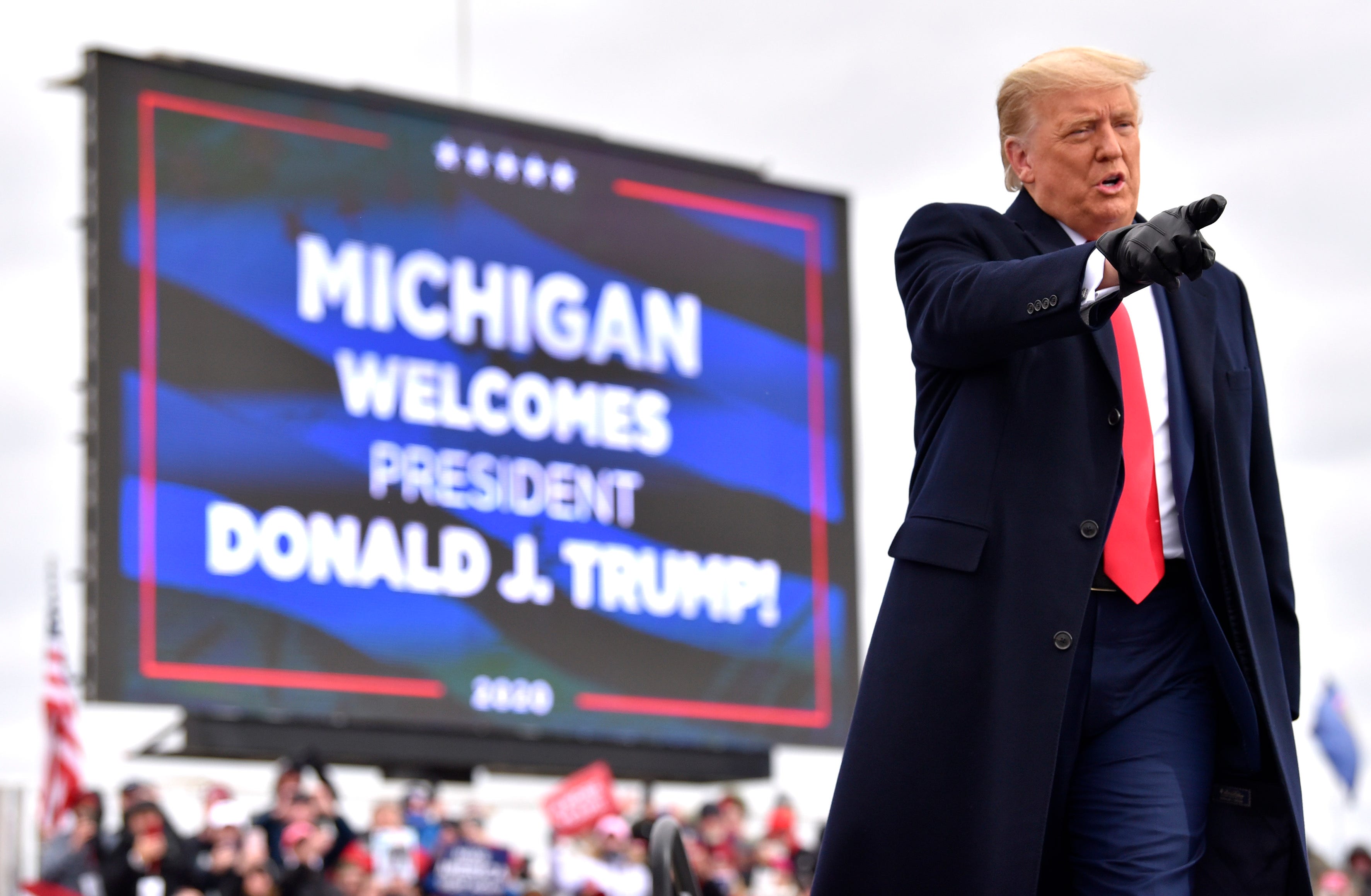 U.S. President Donald Trump takes the stage to speak to supporters at the Oakland International Airport in Waterford Twp., Friday, October 30, 2020, for his Make America Great Again Victory Rally.