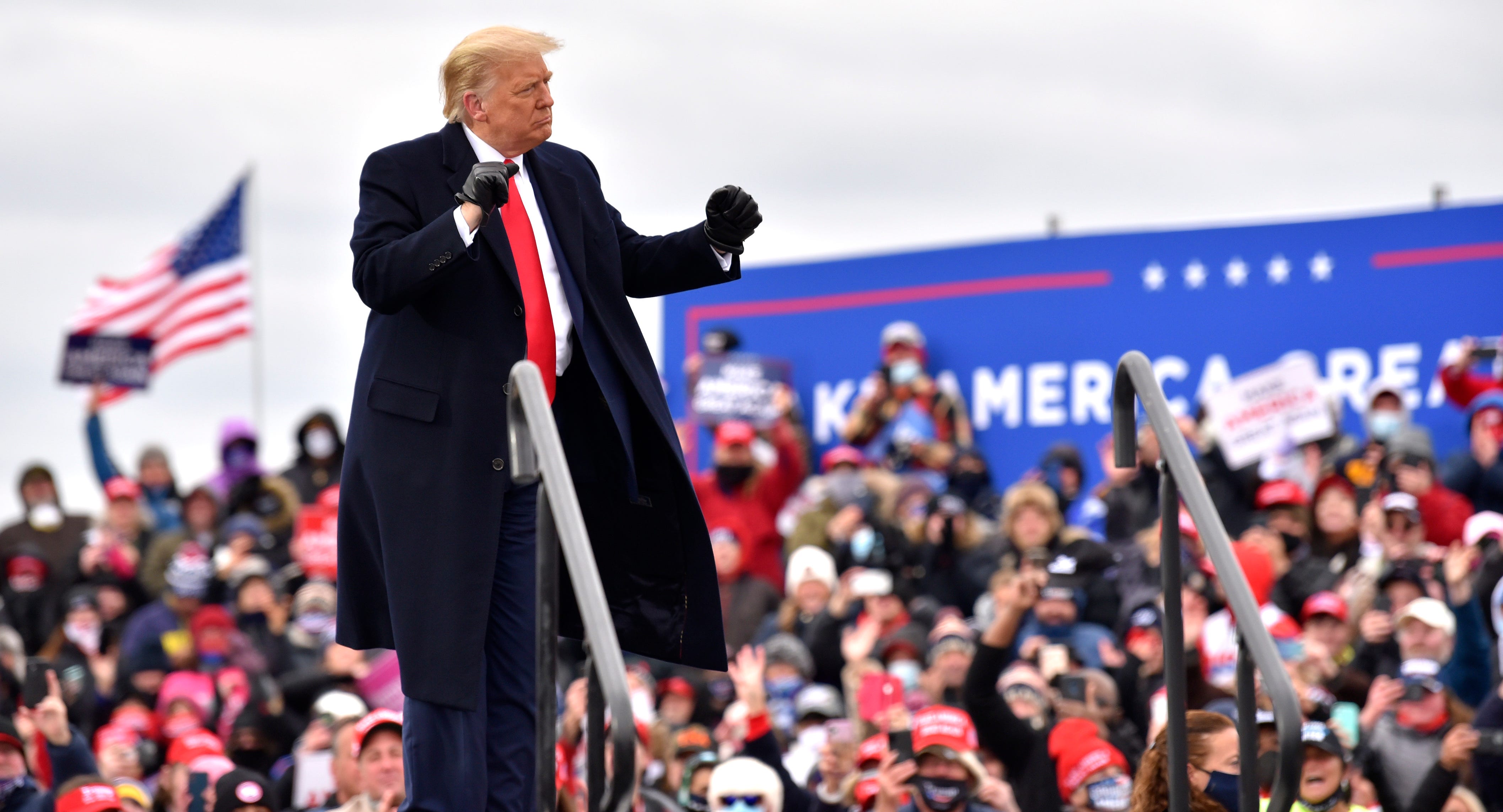 President Trump pumps his fist after he speaks at the Oakland International Airport in Waterford Twp., Friday, October 30, 2020, for his Make America Great Again Victory Rally.
