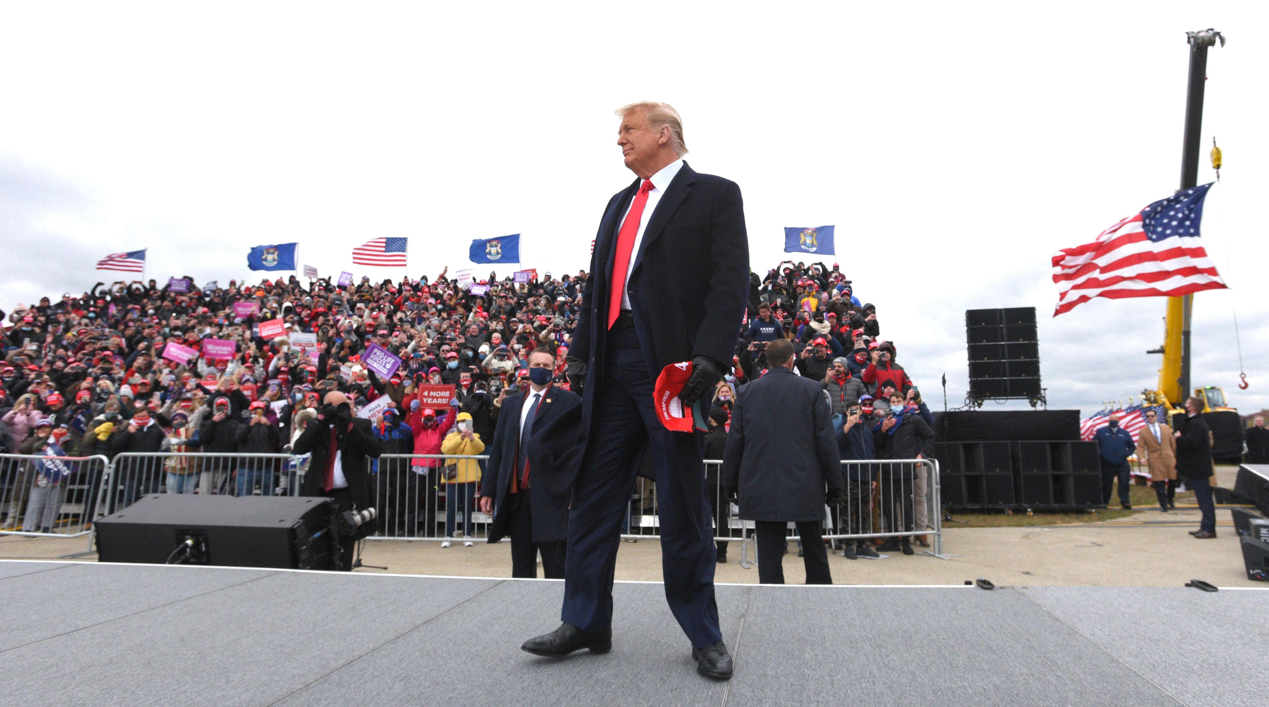 U.S. President Donald Trump takes the stage to speak to supporters at the Oakland International Airport in Waterford Twp., Friday, October 30, 2020, for his Make America Great Again Victory Rally.