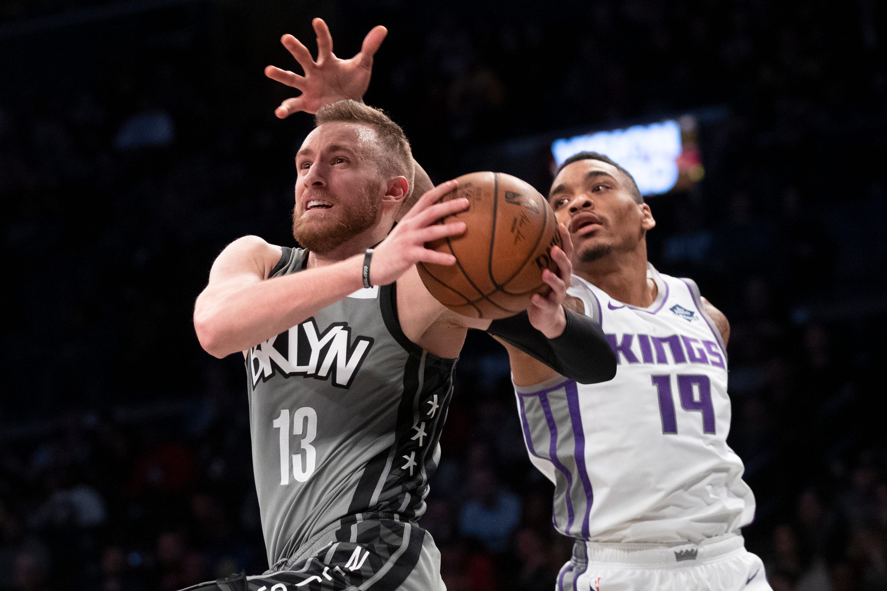 Brooklyn Nets guard Dzanan Musa (13) goes to the basket past Sacramento Kings guard DaQuan Jeffries (19) during the second half of an NBA basketball game, Friday, Nov. 22, 2019, in New York. The Nets won 116-97.