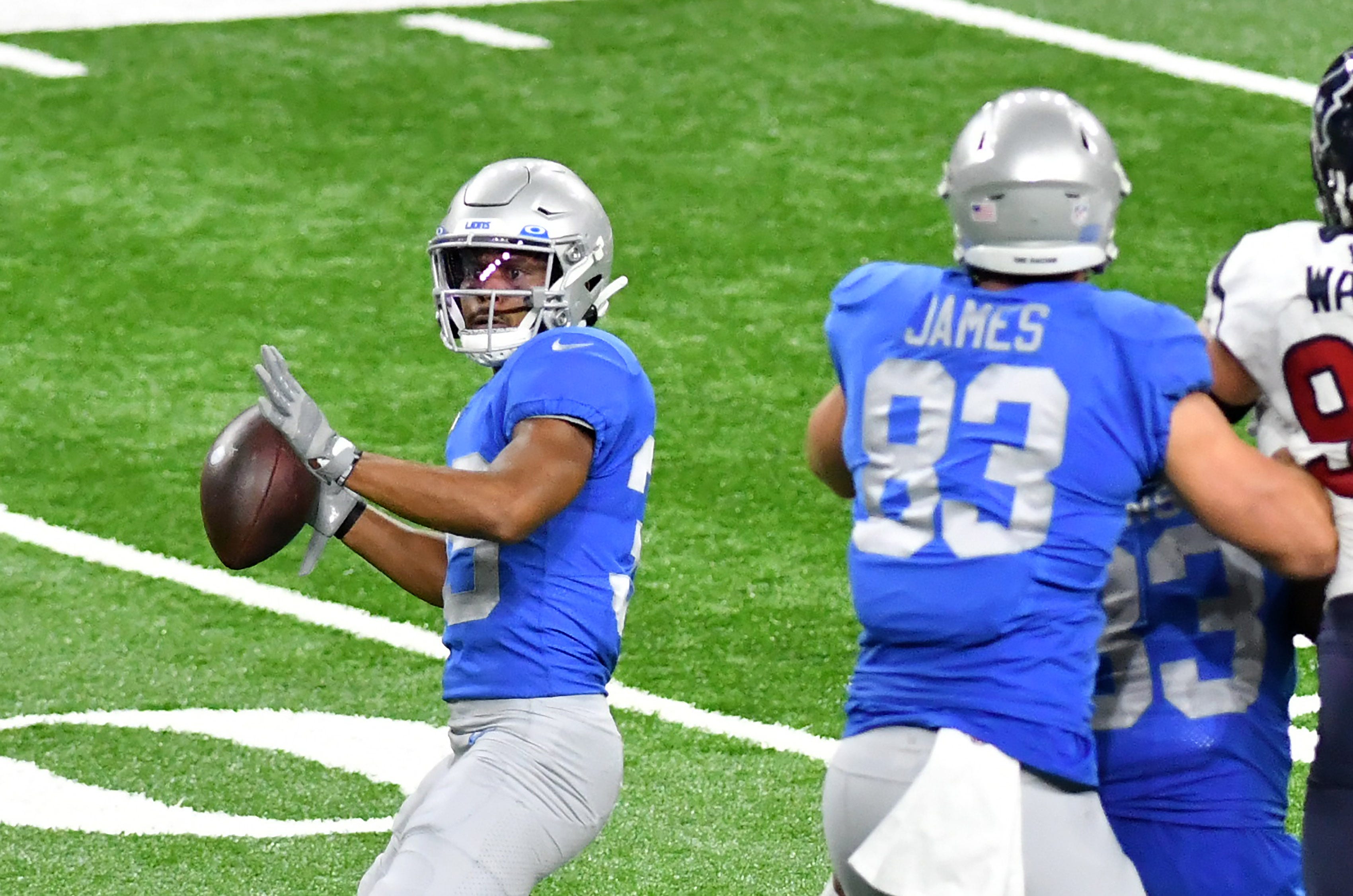 Lions wide receiver Jamal Agnew (39) about to pass to Matthew Stafford in the third quarter.