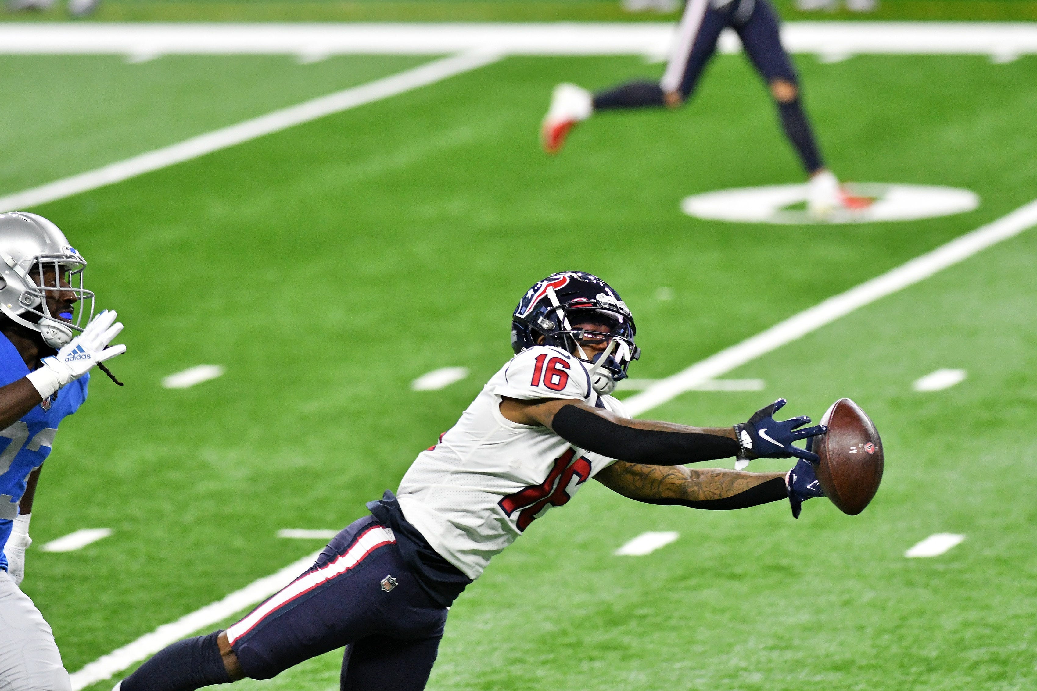 Texans wide receiver Keke Coutee (16) can't hold onto this catch in front of Lions cornerback Desmond Trufant (23) in the first half.