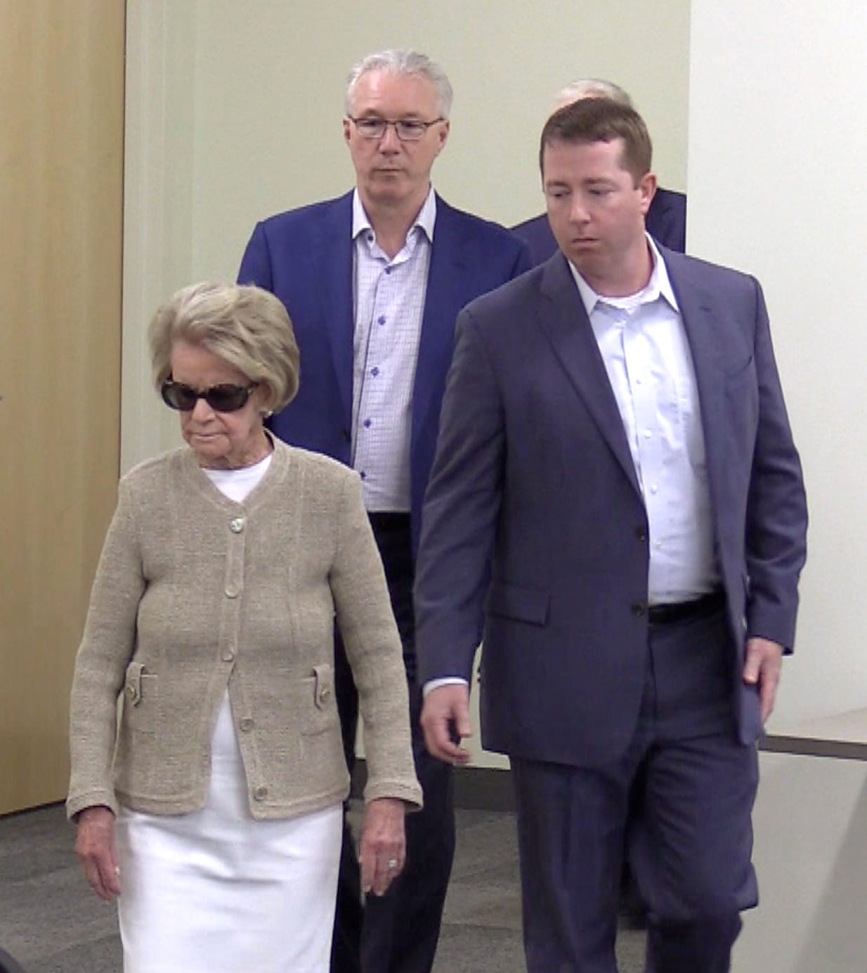 Detroit Lions owner and chairman Martha Firestone Ford, Team President Rod Wood and Executive Vice President & General Manager Bob Quinn arrive for the press conference.   Detroit Lions head coach Matt Patricia press conference, concerning indicted but not tried in 1996 sex assault, at training facility in Allen Park, Michigan on May 10, 2018.  (Image by Daniel Mears / The Detroit News).