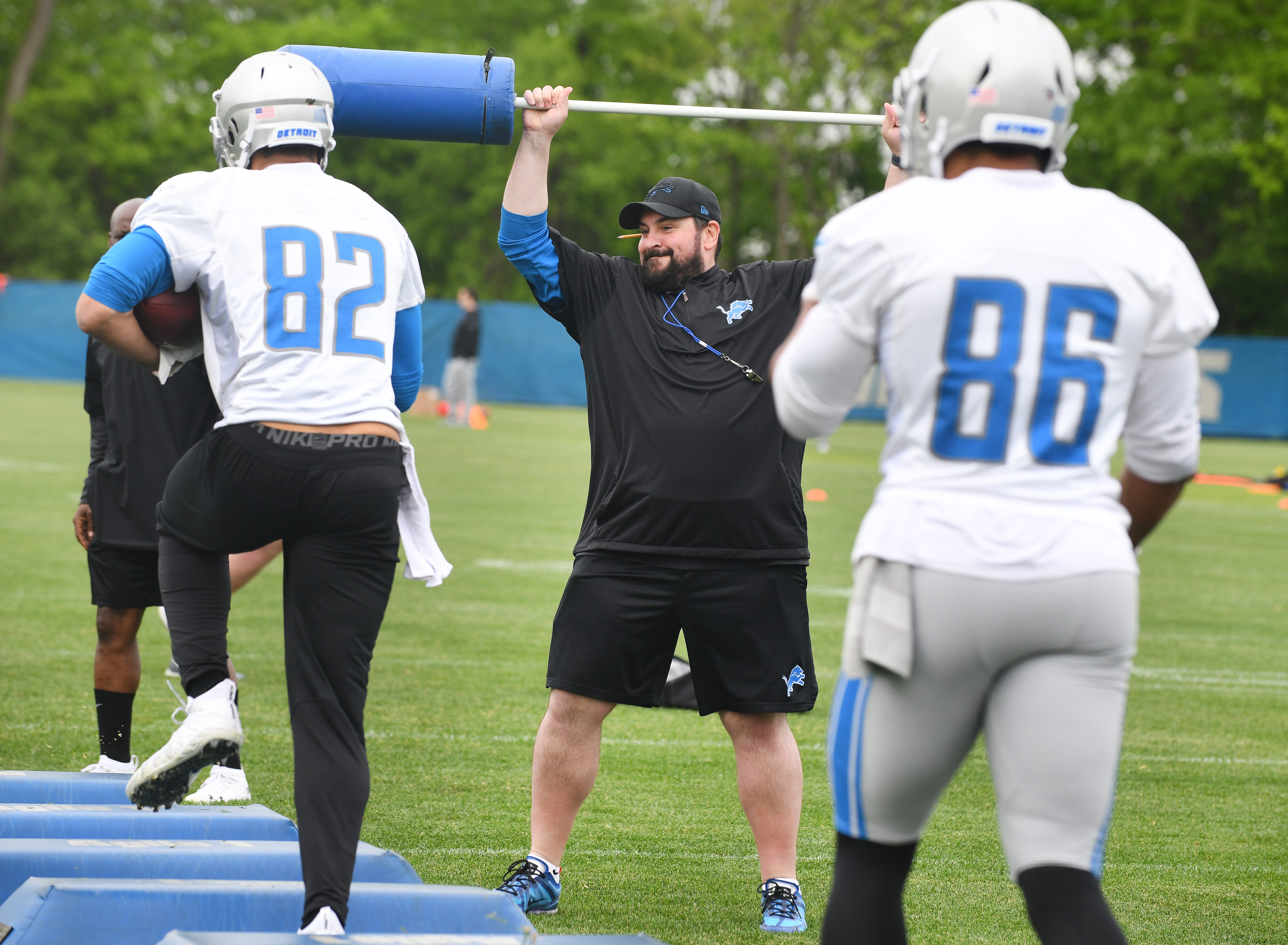 Lions head coach Matt Patricia adds some pop to the obstacles drill during OTA on Tuesday.  Detroit Lions press conference with head coach Matt Patricia at the training facility in Allen Park, Michigan on May 21, 2019.   (Image by Daniel Mears/ The Detroit News).