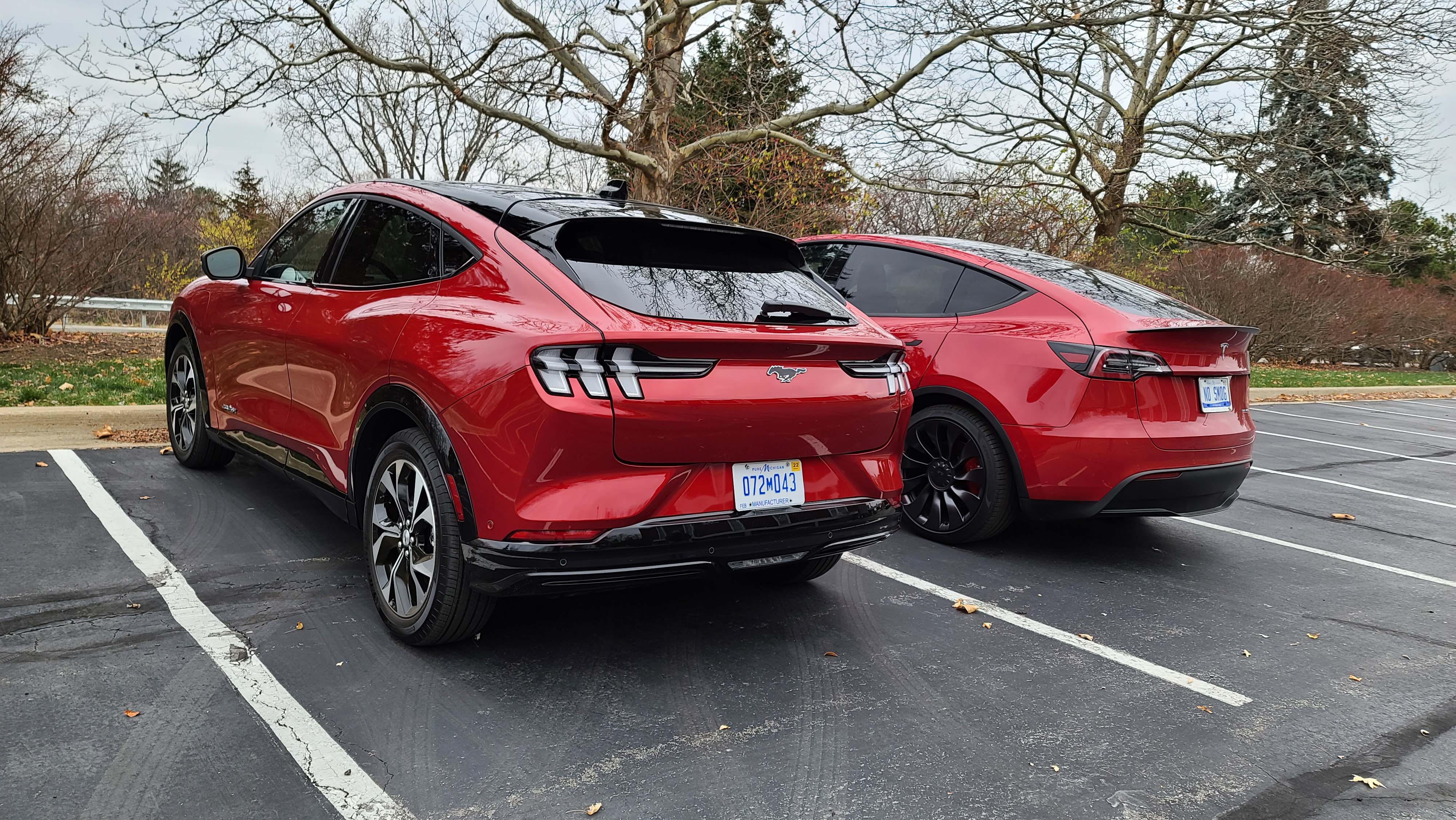 The 2021 Ford Mustang Mach-E (left) and Tesla Model Y are prime competitors in the compact SUV luxury segment.