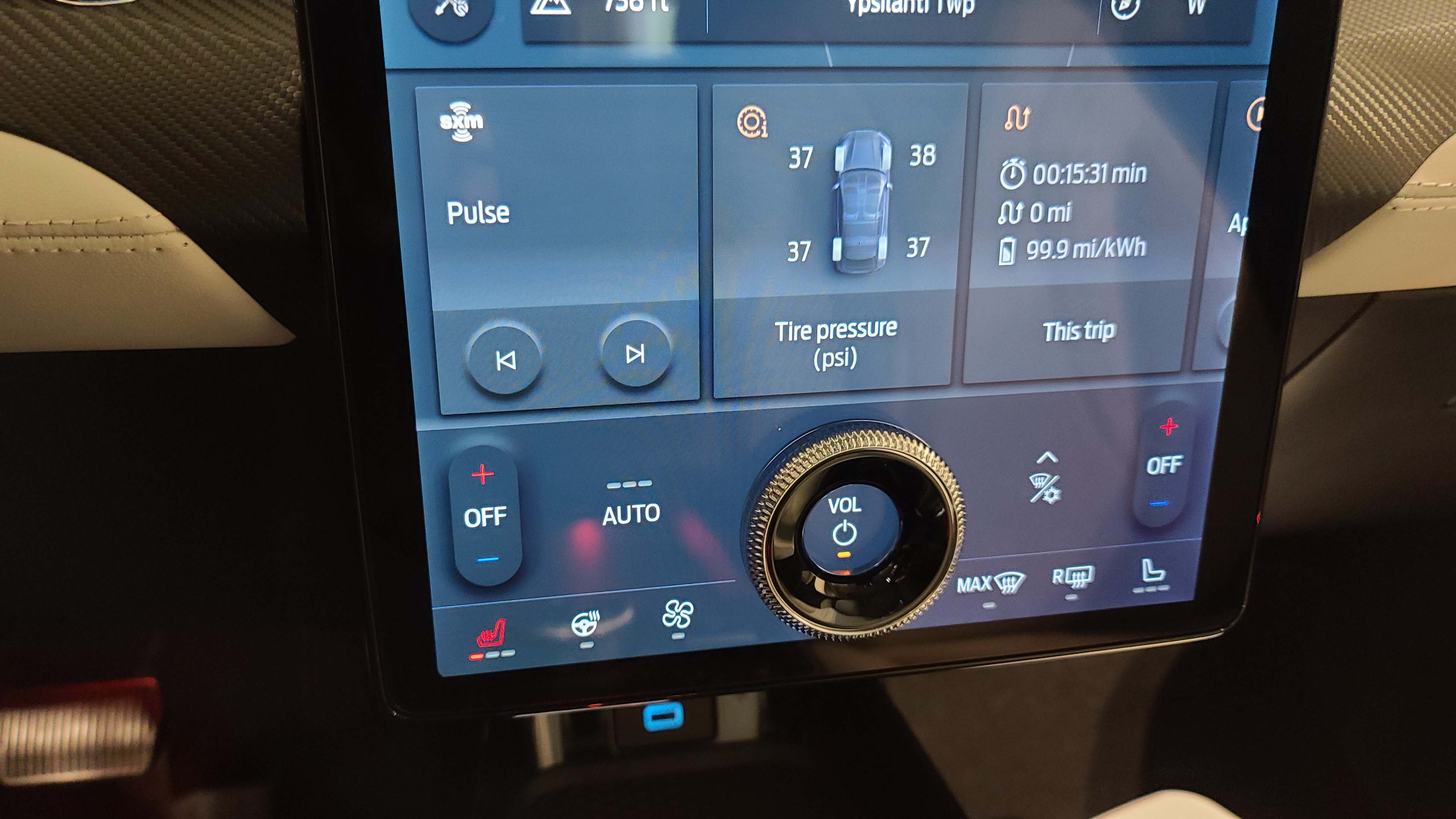 The big, 15.5-inch touchscreen on the 2021 Ford Mustang Mach-E is anchored by a big volume knob.