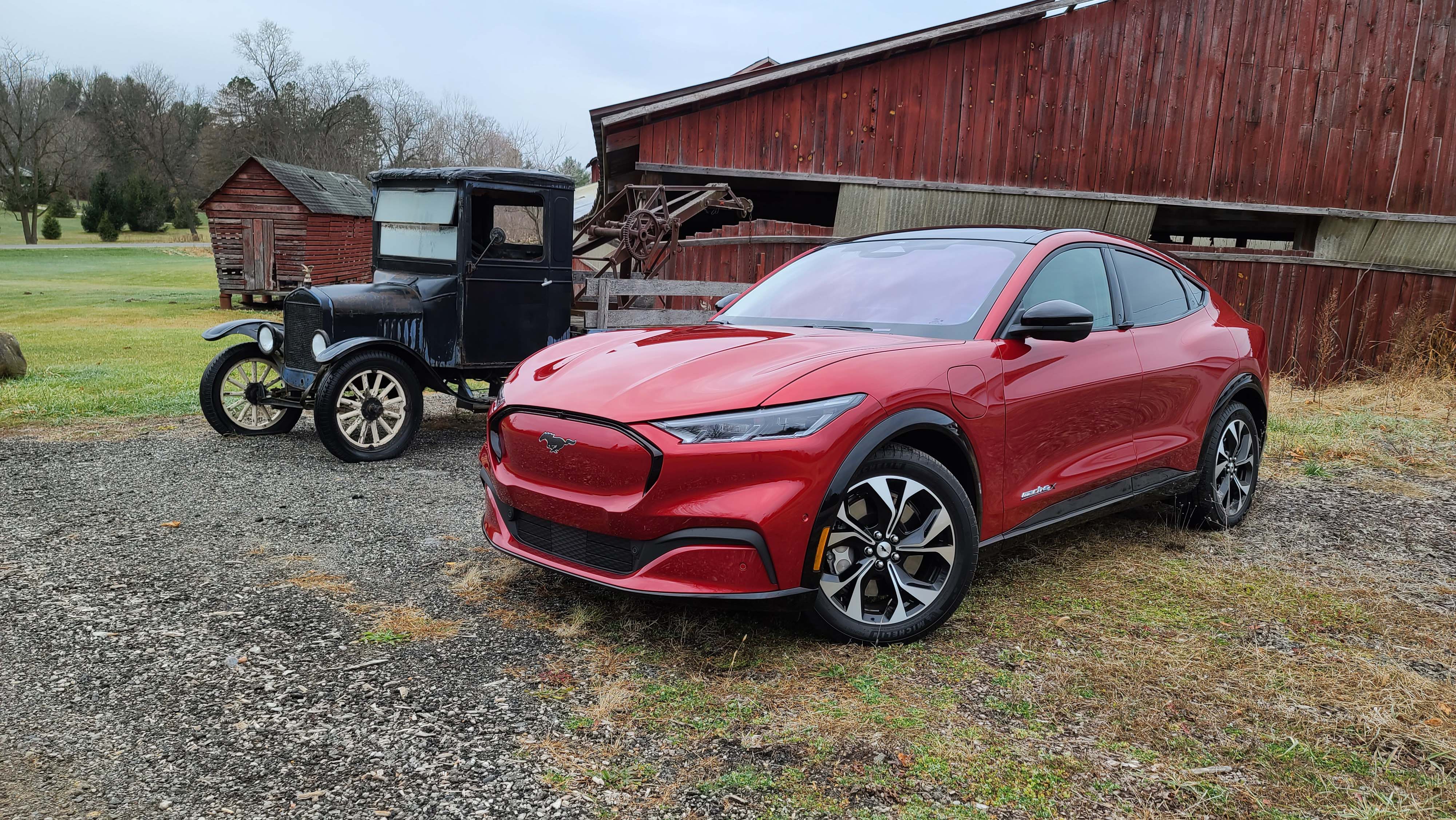 One-hundred years after Ford put electric vehicles out of business with its gas-powered Model T (left), the 2021 Ford Mustang Mach-E seeks to help pioneer a new-generation of EVs.