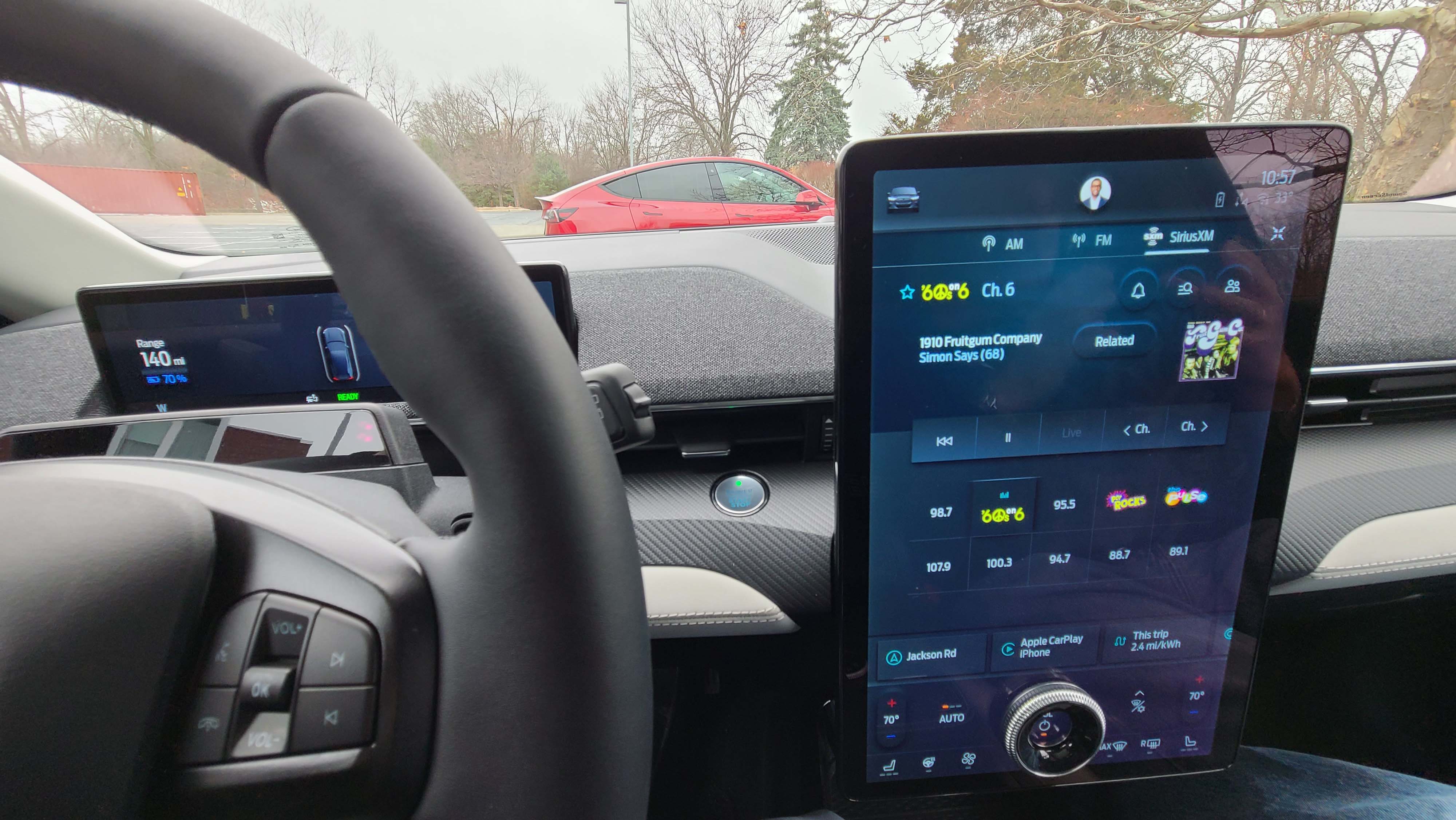 Apple CarPlay and Sirius XM. The 2021 Ford Mustang Mach-E offers Sirius XM and smartphone apps like Apple CarPlay unlike Tesla.