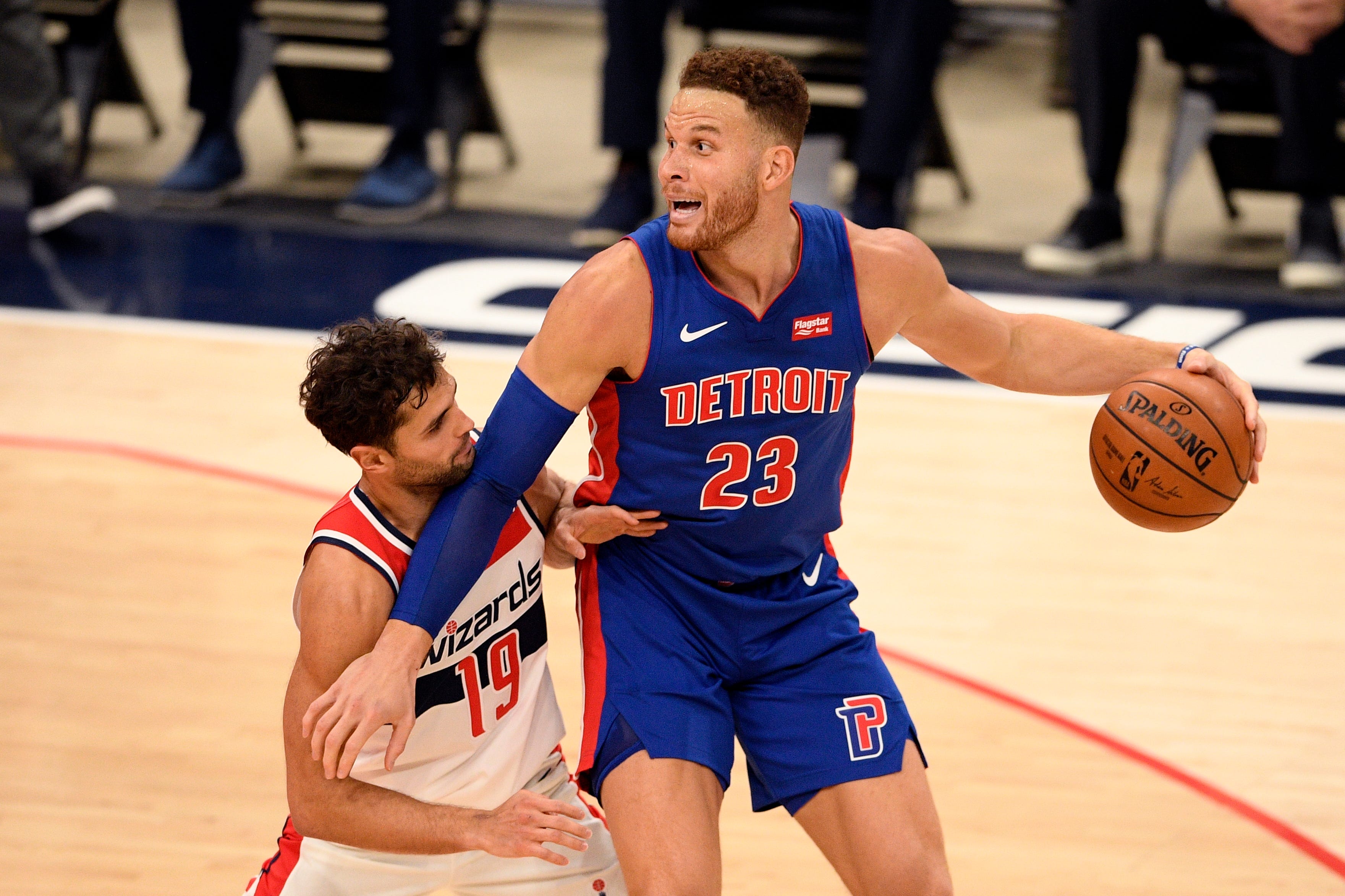 Detroit Pistons forward Blake Griffin (23) dribbles the ball next to Washington Wizards guard Raul Neto (19) during the second half.