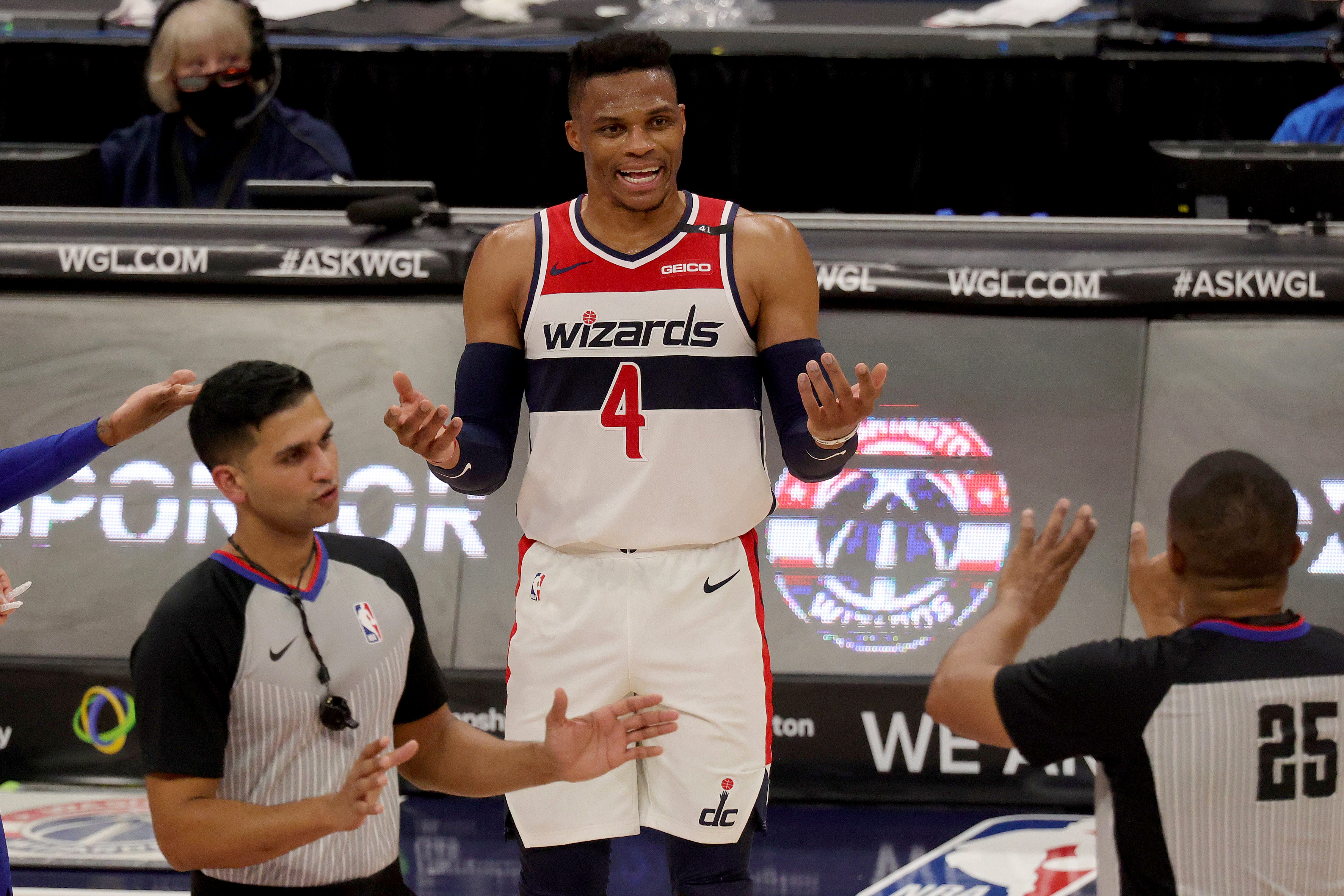 Washington Wizards Russell Westbrook (4) talks with officials during the first half.
