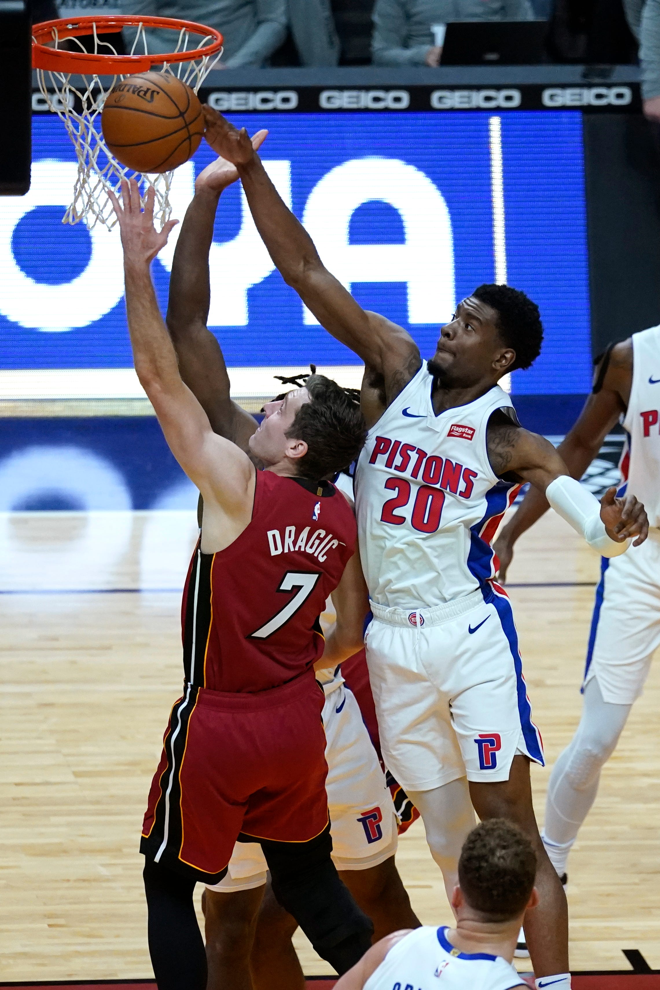 Miami Heat guard Goran Dragic (7) shoots as Detroit Pistons guard Josh Jackson (20) defends during the second half.