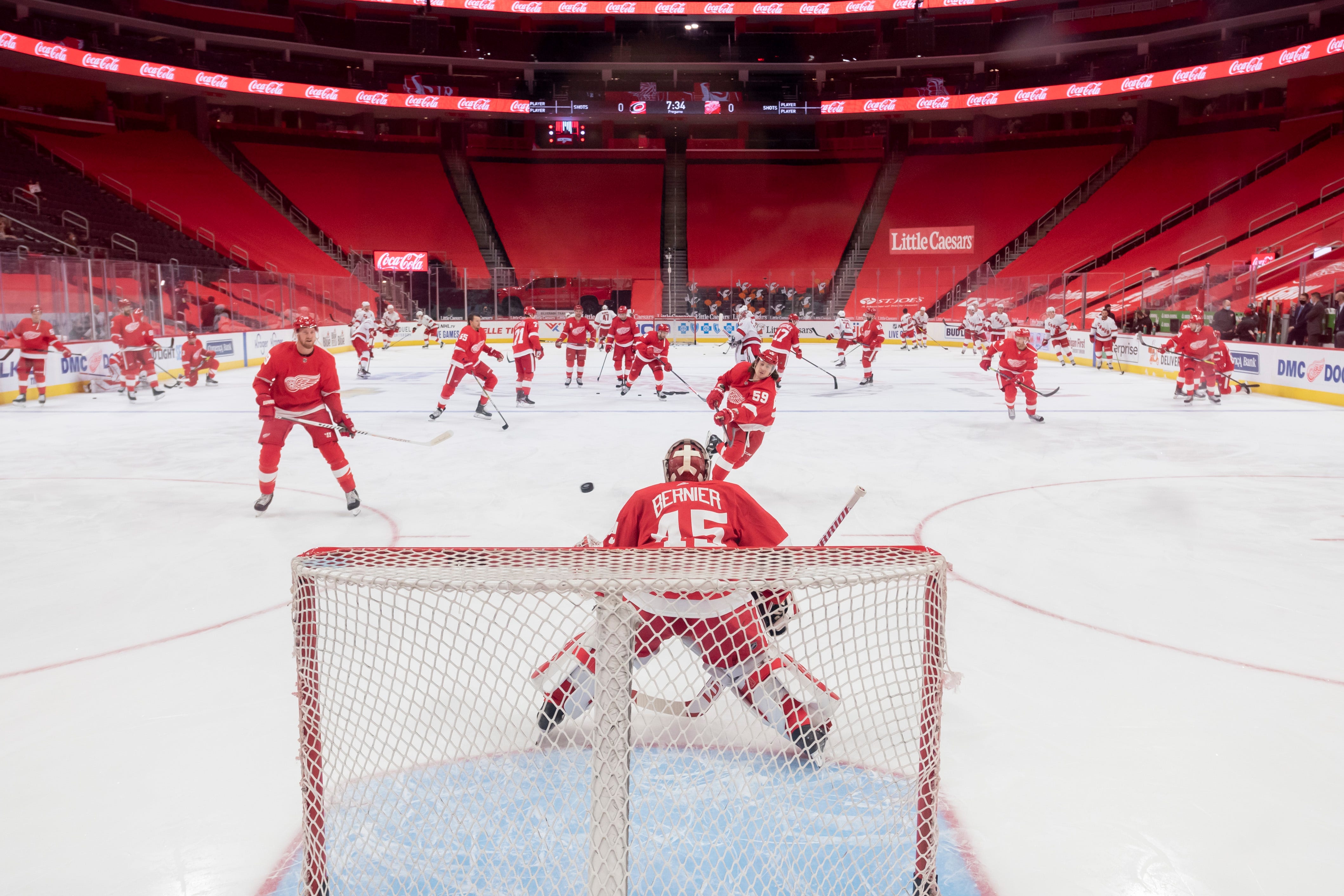 The Red Wings warm up before the start of a game against the Carolina Hurricanes, at Little Caesars Arena, in Detroit, January 16, 2021.