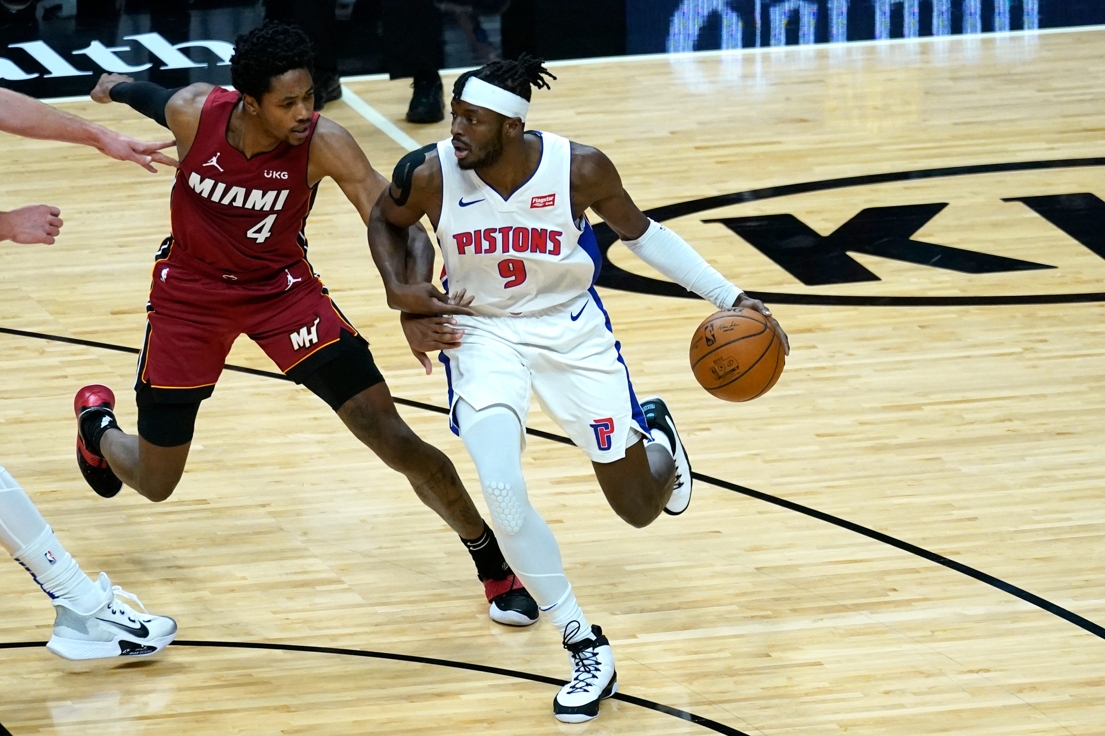 Detroit Pistons forward Jerami Grant (9) drives to the basket as Miami Heat forward KZ Okpala (4) defends during the first half.